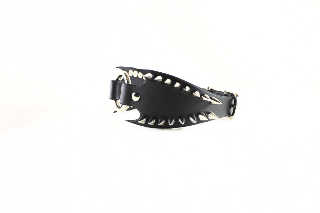 Leather Submissive Collar with spiked fanged edges, showcasing gothic style and bold BDSM design.
