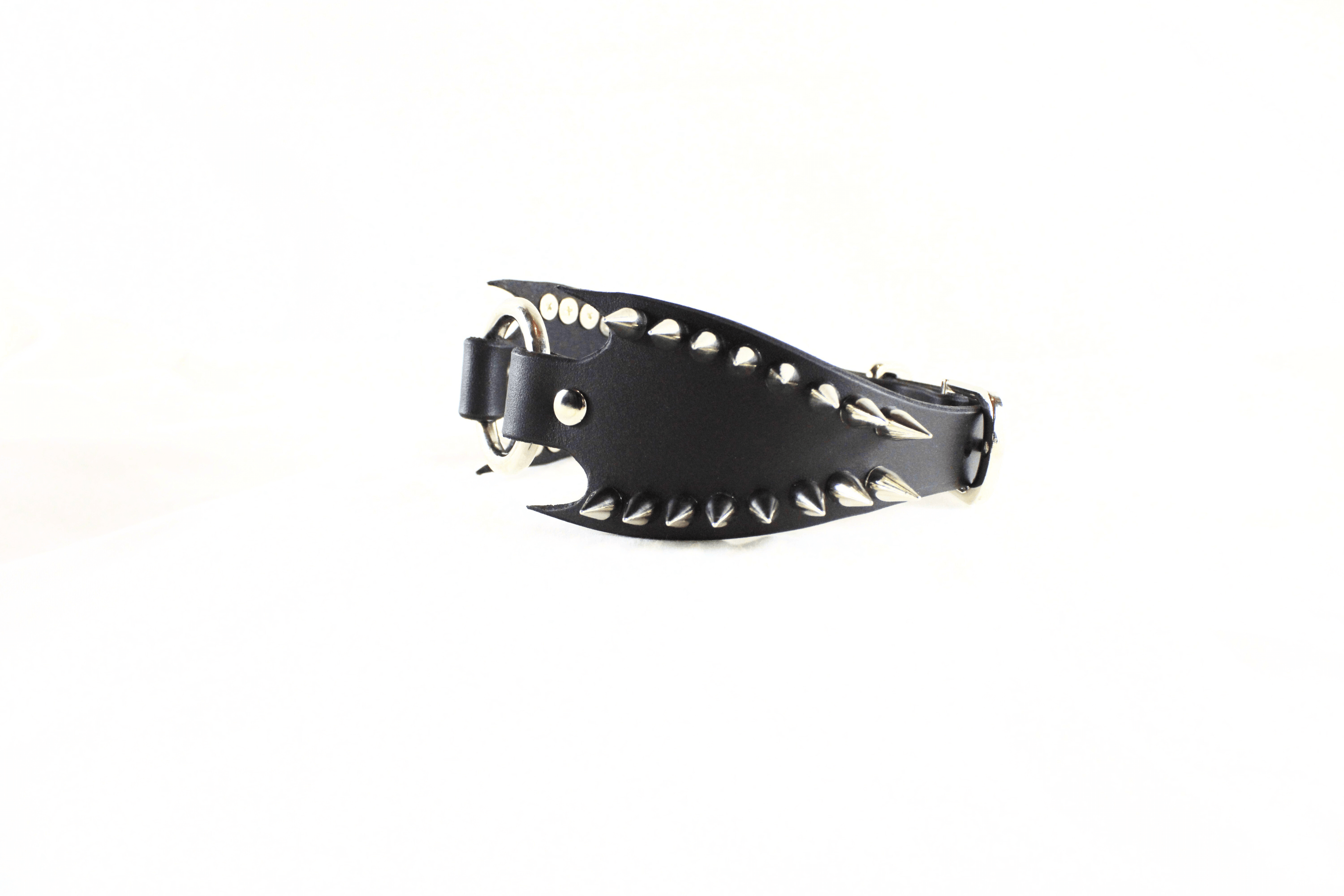 Leather Submissive Collar with spiked fanged edges, showcasing gothic style and bold BDSM design.
