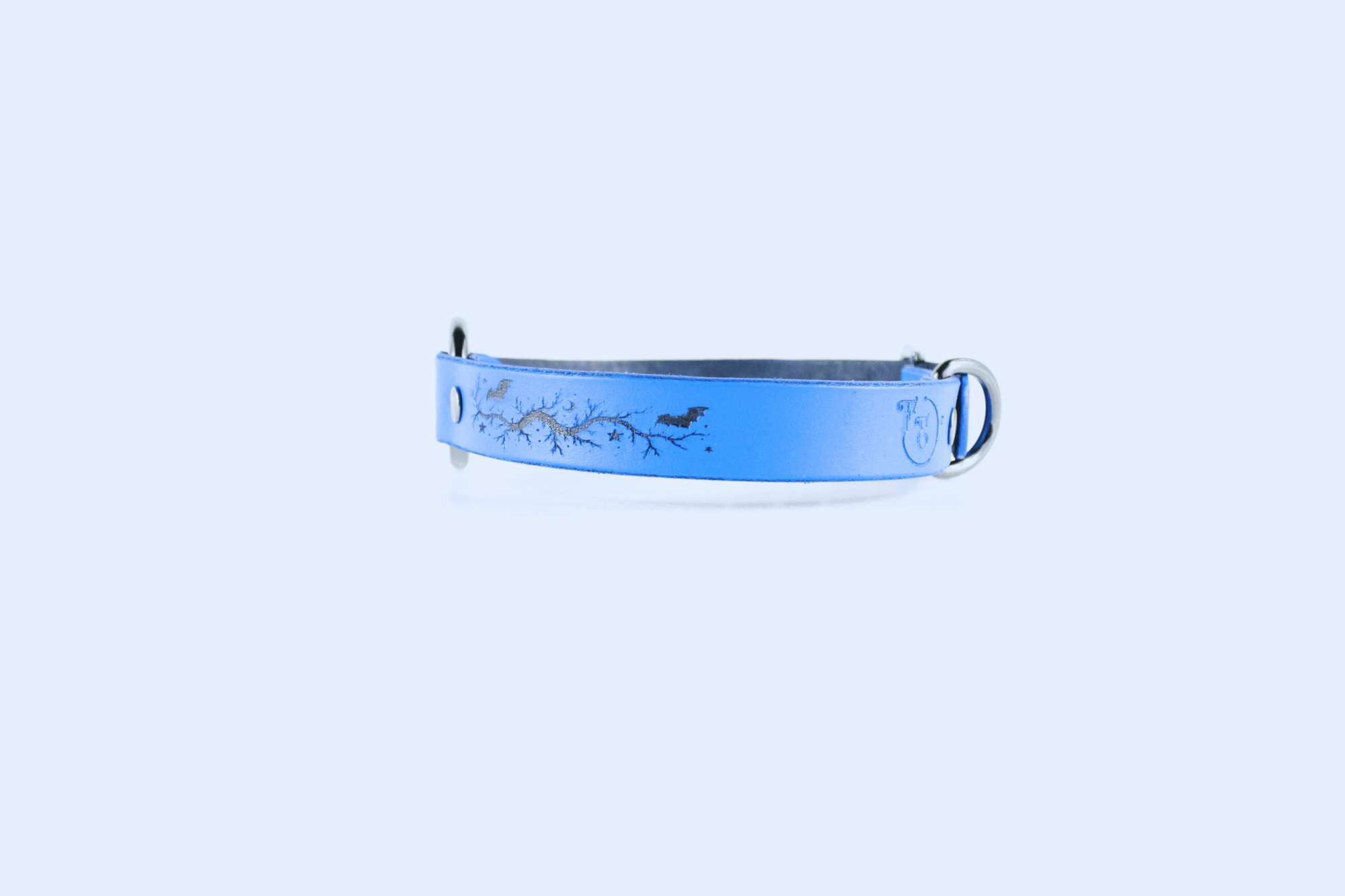 Submissive Collar Blue Moon & Bats Leather Choker showcasing a blue leather band with bat and moon designs.