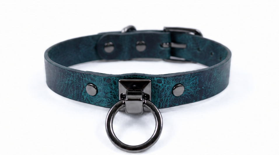 A dark green leather choker collar with a metal ring and buckle.