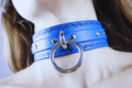 Floral Vine Leather Choker in blue with O-ring detail and floral motif on structured design.