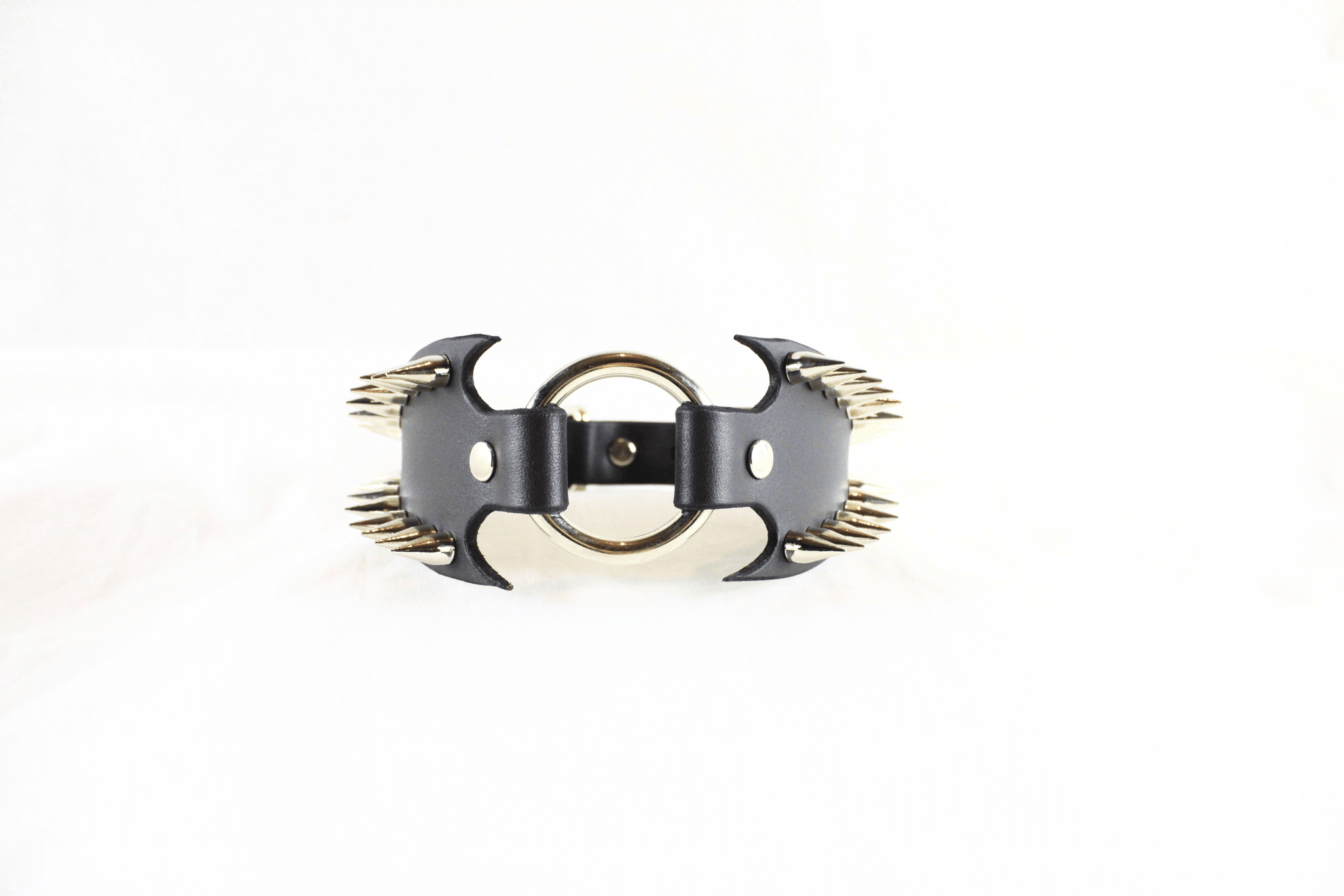 Leather Submissive Collar with sharp metallic spikes, highlighting gothic style and bold BDSM fashion.