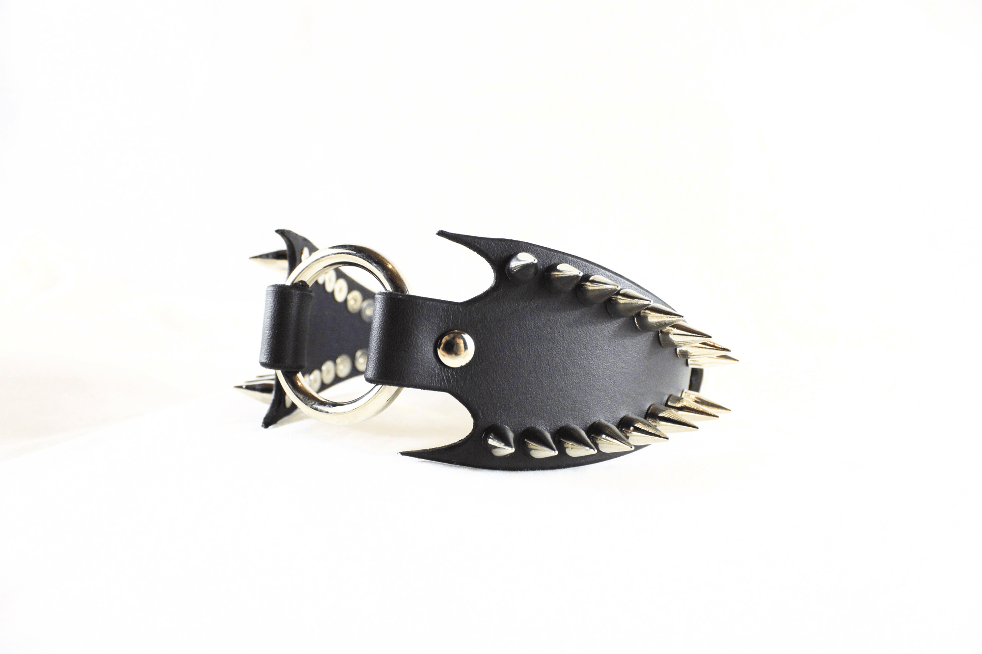 Leather Submissive Collar with spiked fang edges and gothic design, perfect for BDSM and fetish enthusiasts.