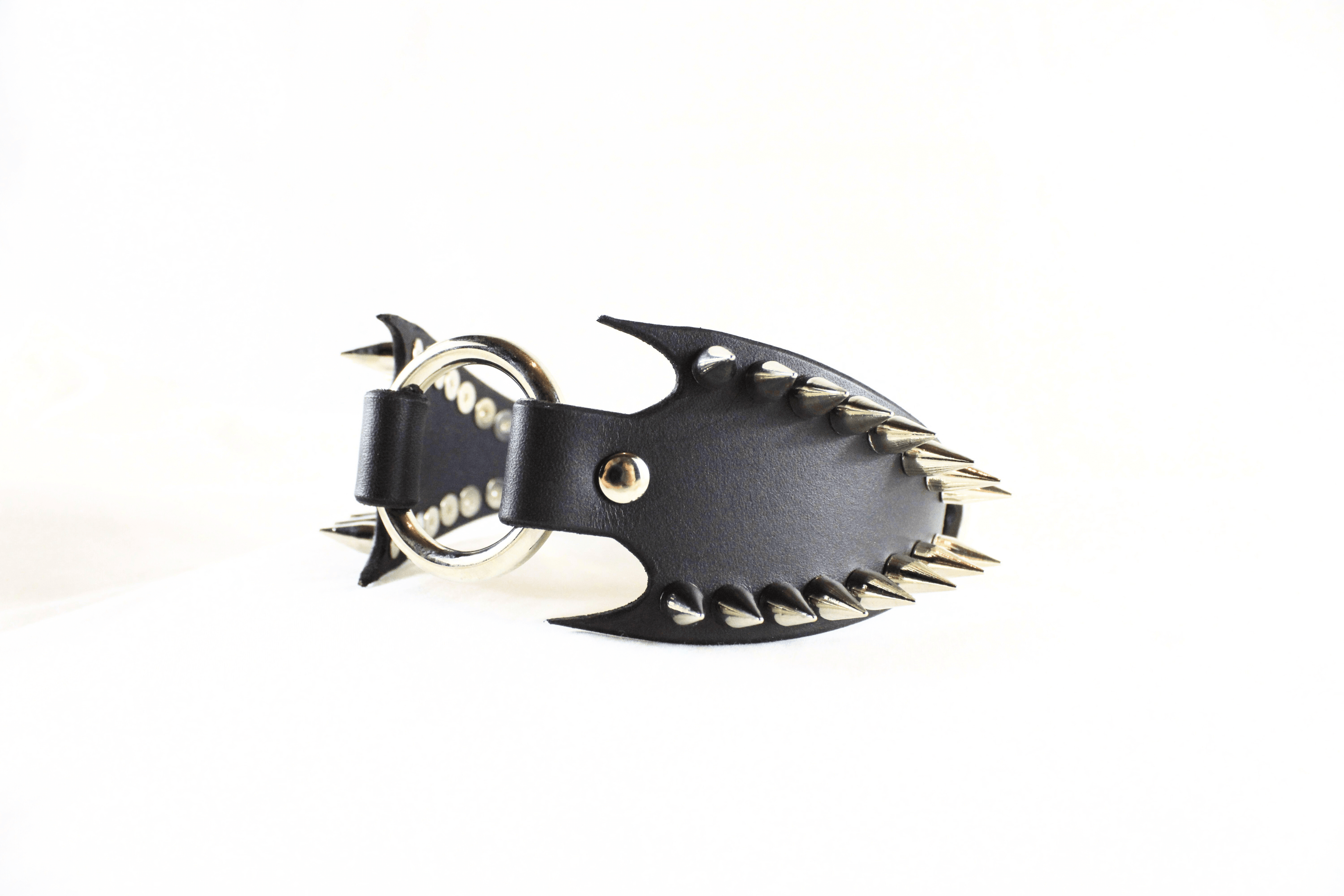 Leather Submissive Collar with spiked fang edges and gothic design, perfect for BDSM and fetish enthusiasts.