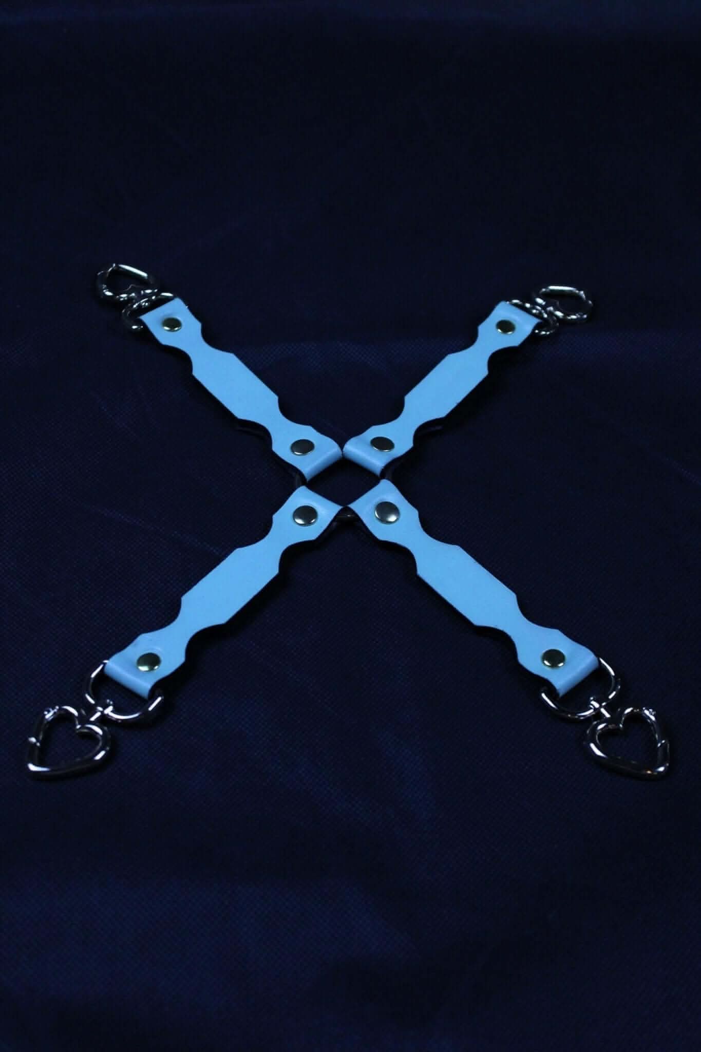 Blue leather 4-way connector straps for BDSM bondage play, ideal for linking cuffs and collars.