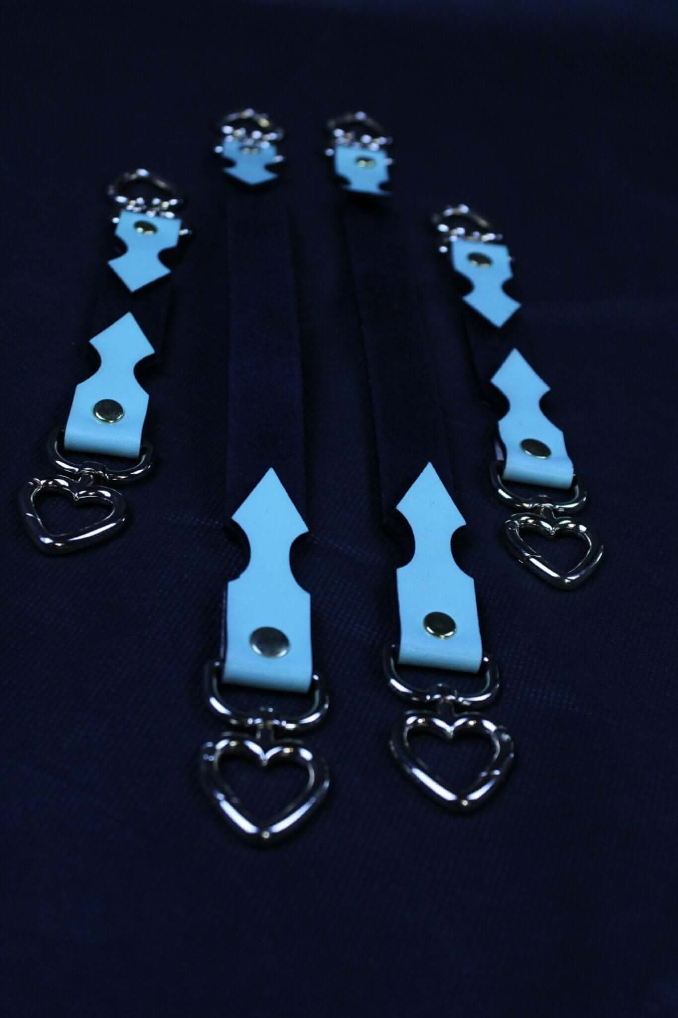 High-quality connector straps for BDSM, designed for linking restraints like cuffs and collars. Perfect for bondage play.