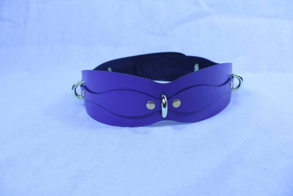 Handmade purple leather restraint belt with D-rings for BDSM, submissive play, and bondage gear.