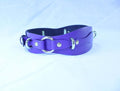 Purple leather waist belt with D-ring for bondage, adjustable restraint harness for BDSM scenes and rituals.