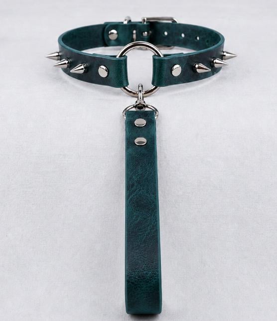 A dark green leather choker necklace with spikes and a metal clasp.