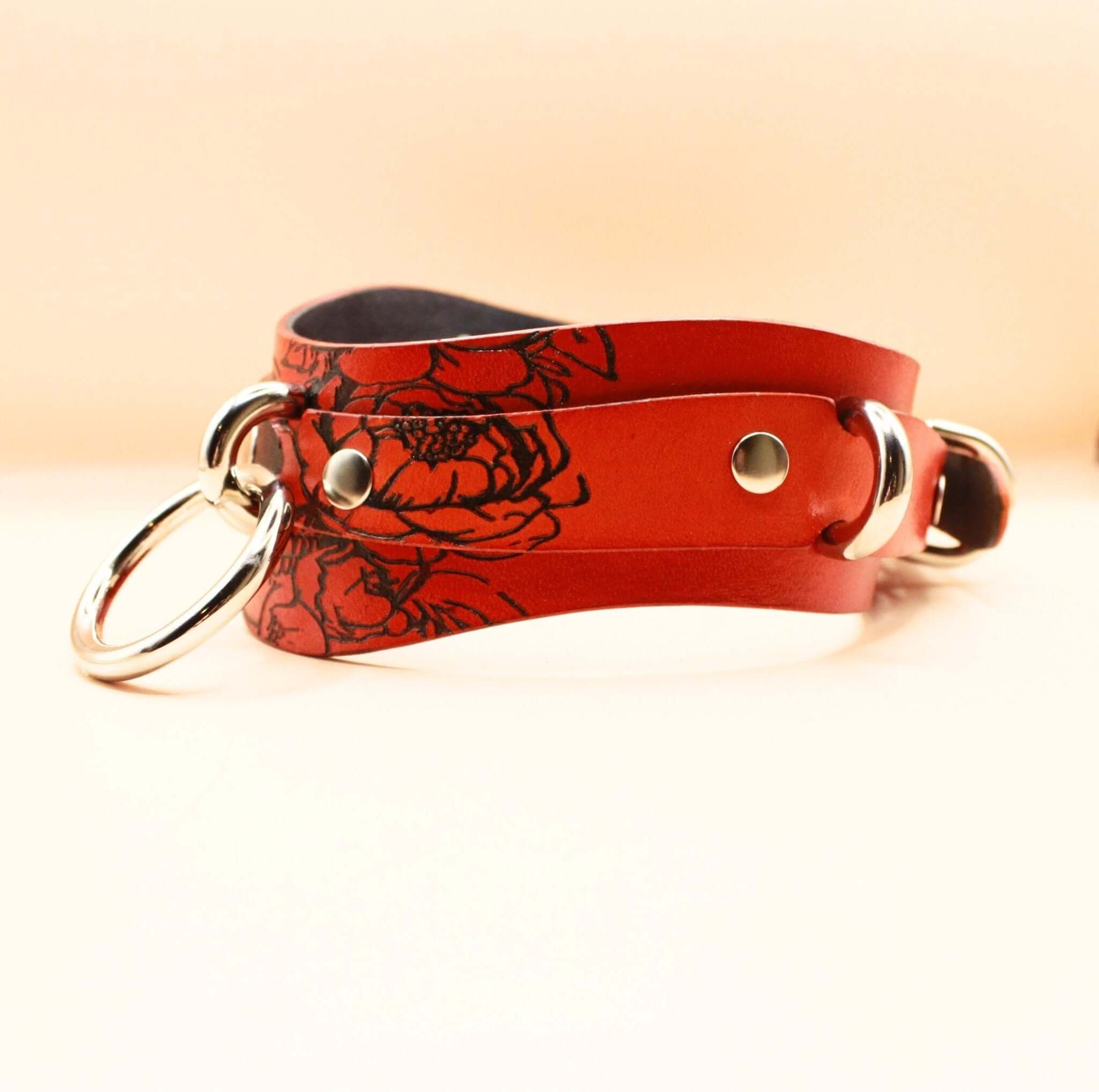 Bold Skull leather BDSM collar with floral design, ideal for submissive jewelry and bondage gear.