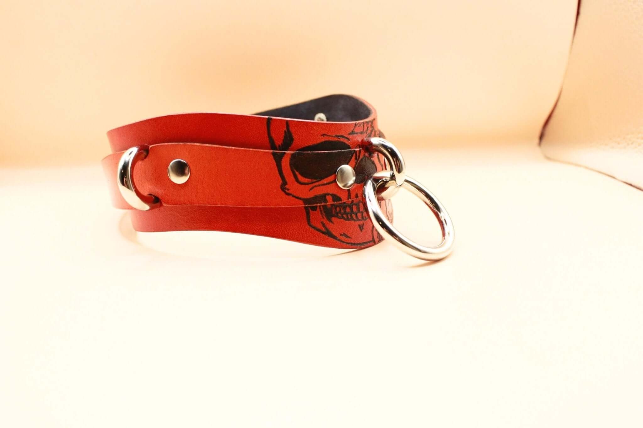 Bold Skull leather BDSM collar featuring a striking design, ideal for submissive jewelry and bondage gear.