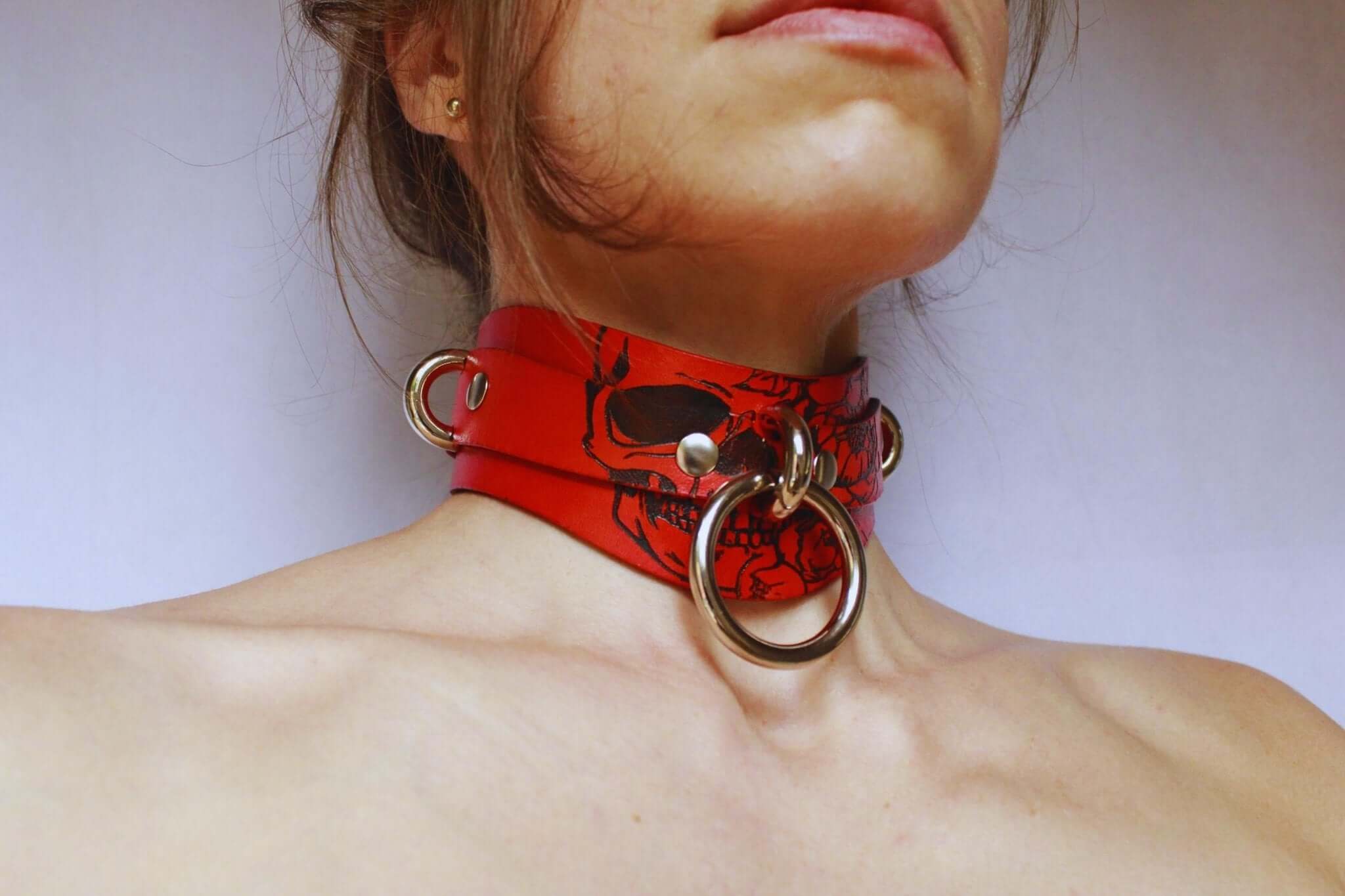 Bold Skull leather BDSM collar featuring a striking design, perfect for submissive jewelry and bondage wear.