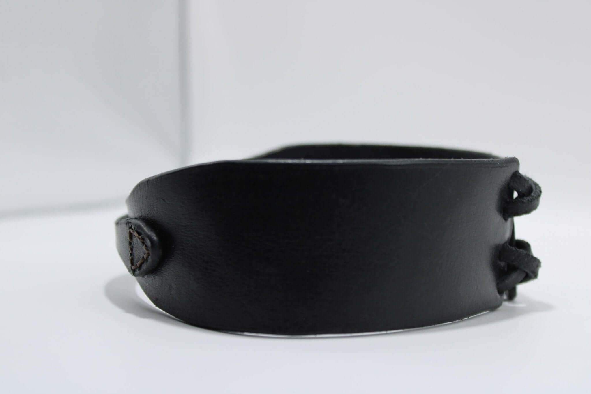 Minimalist black leather BDSM collar, perfect for submissive jewelry and discreet day wear in bondage roleplay.
