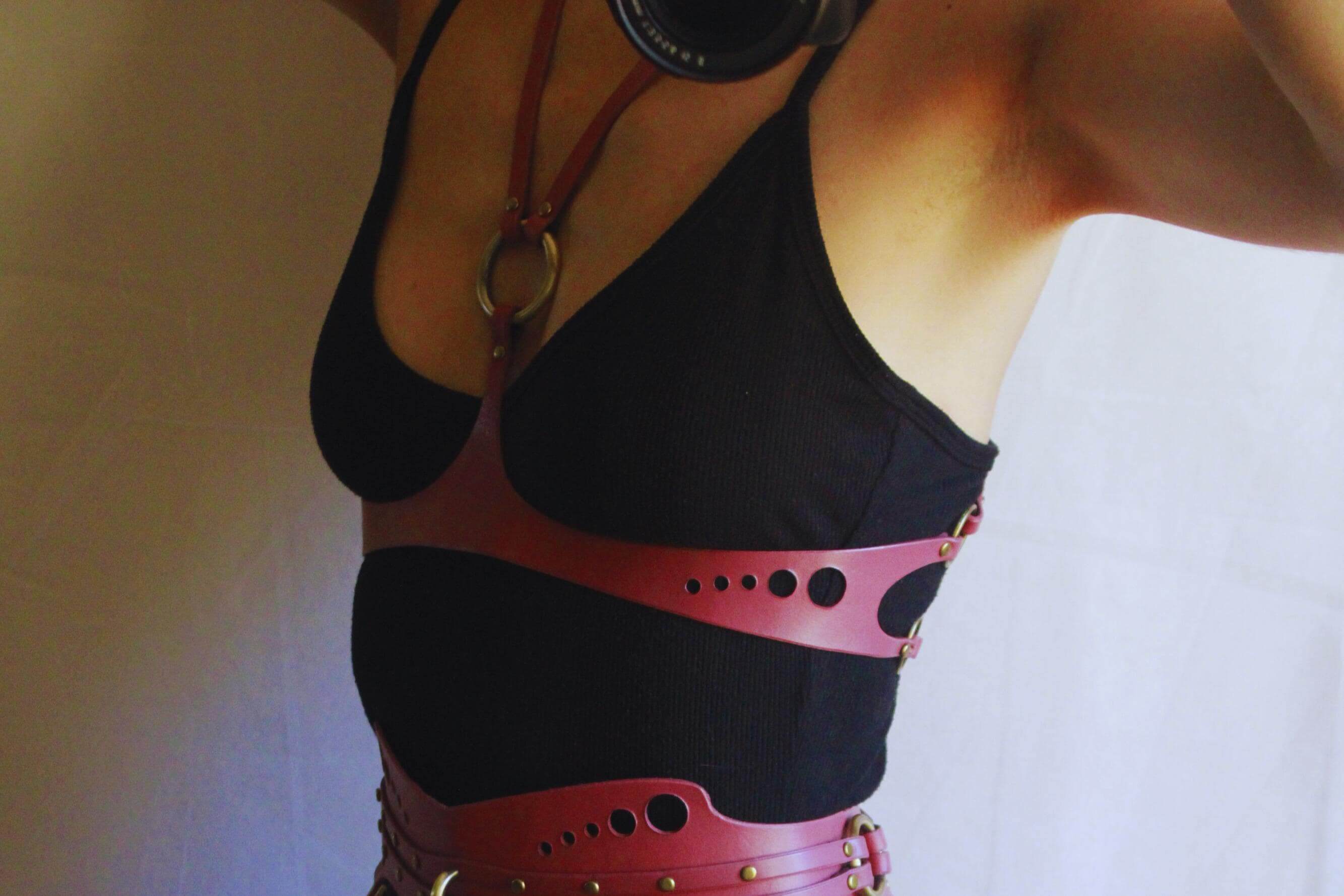 Stylish underbust BDSM leather harness, perfect for bondage gear and enhancing curves, ideal for sub and dom play.
