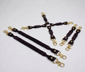 a collection of dark purple leather straps with gold metal clasps and buckles, arranged on a white background.