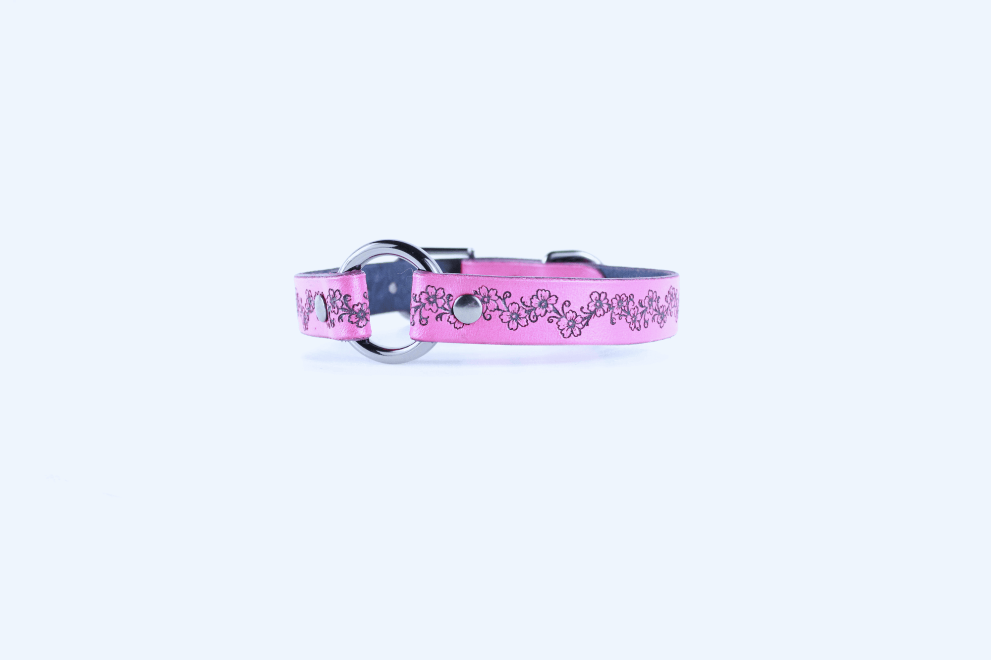 BDSM Collar Floral in pink leather with a delicate vine design, symbolizing connection and beauty.