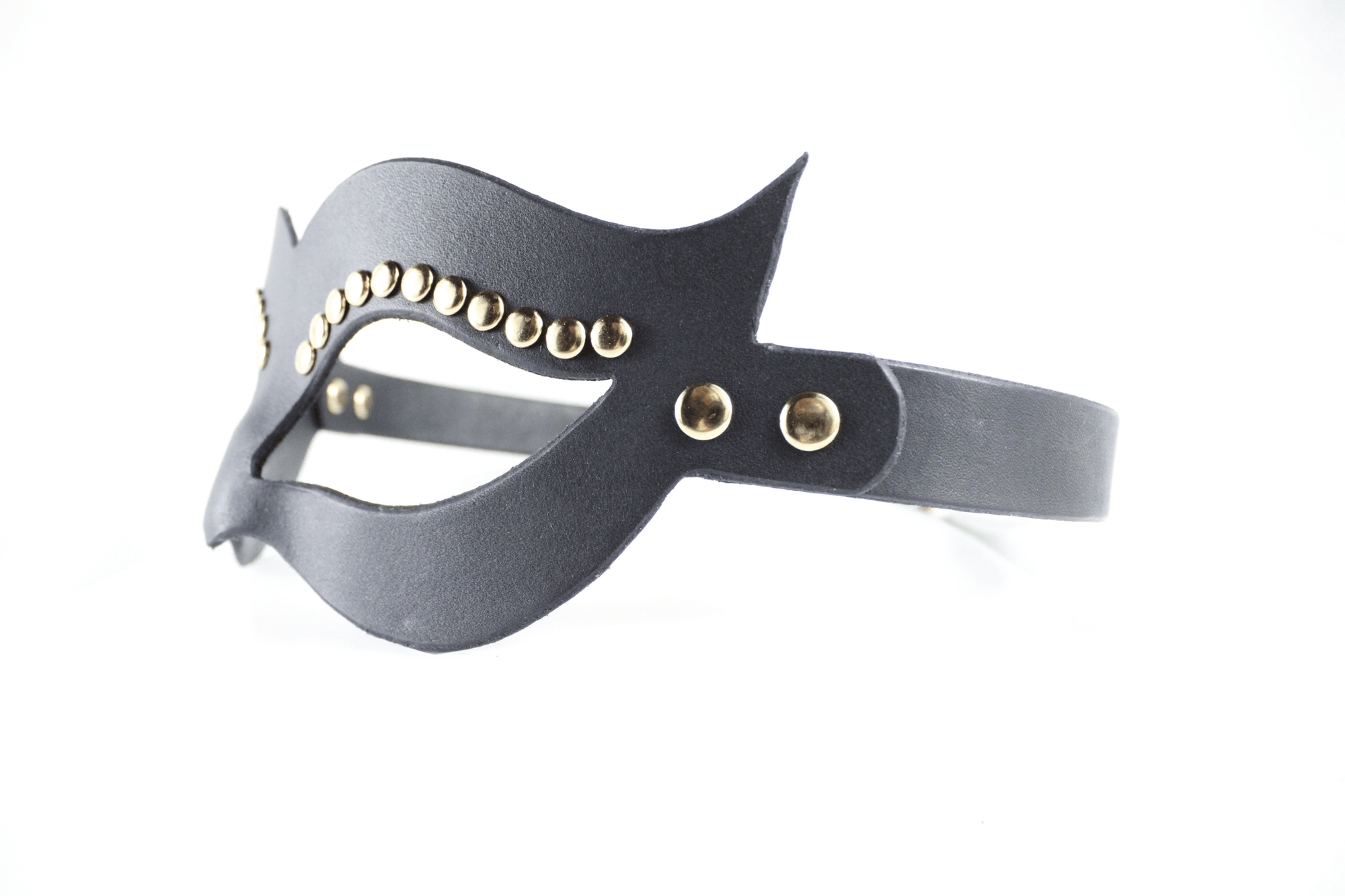 A black leather mask with gold studs on the sides.