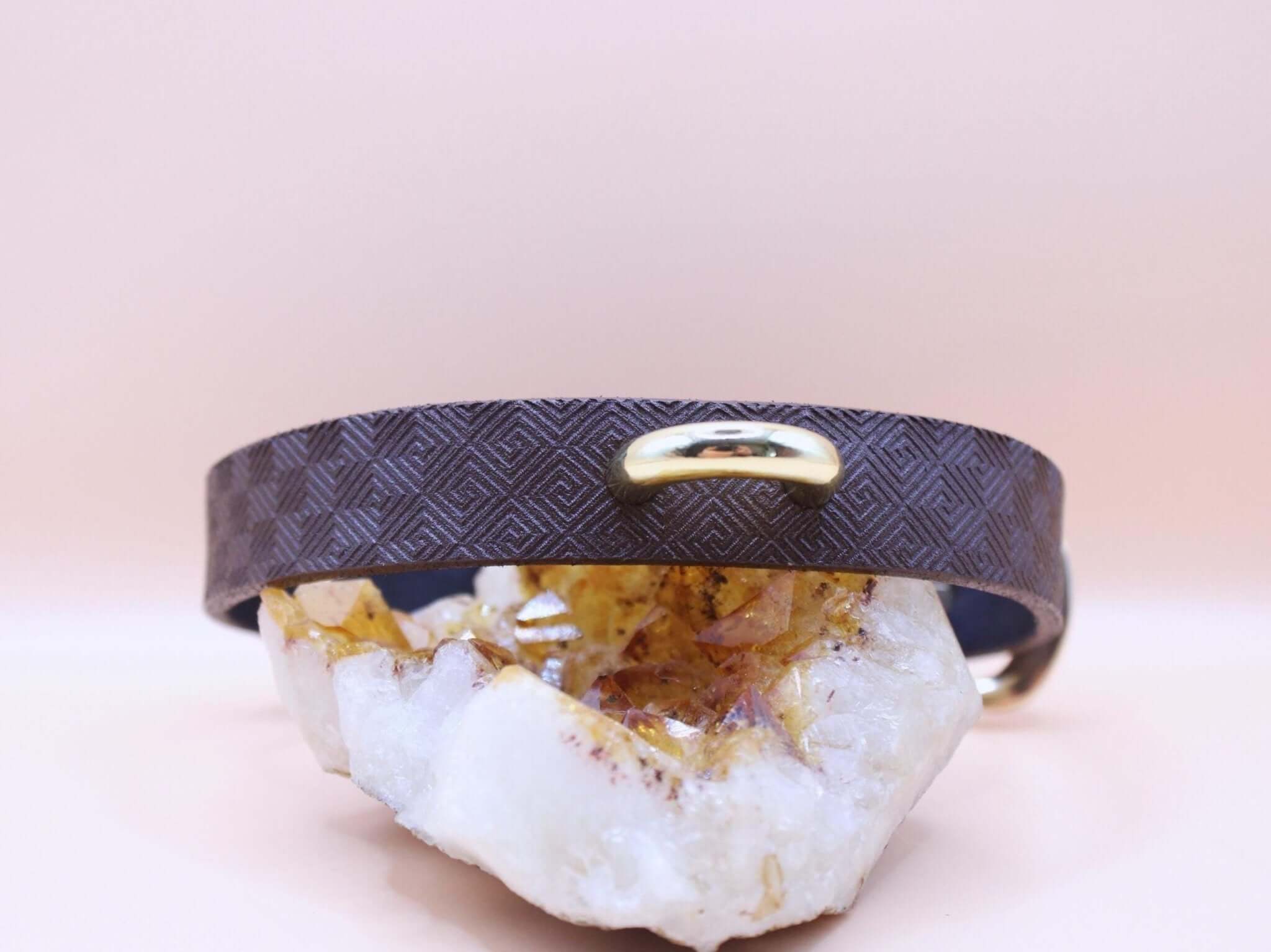 Elegant dark brown leather day collar with geometric pattern, perfect for discreet BDSM and submissive style.