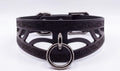 A black leather choker necklace with a metal ring and a metal buckle.