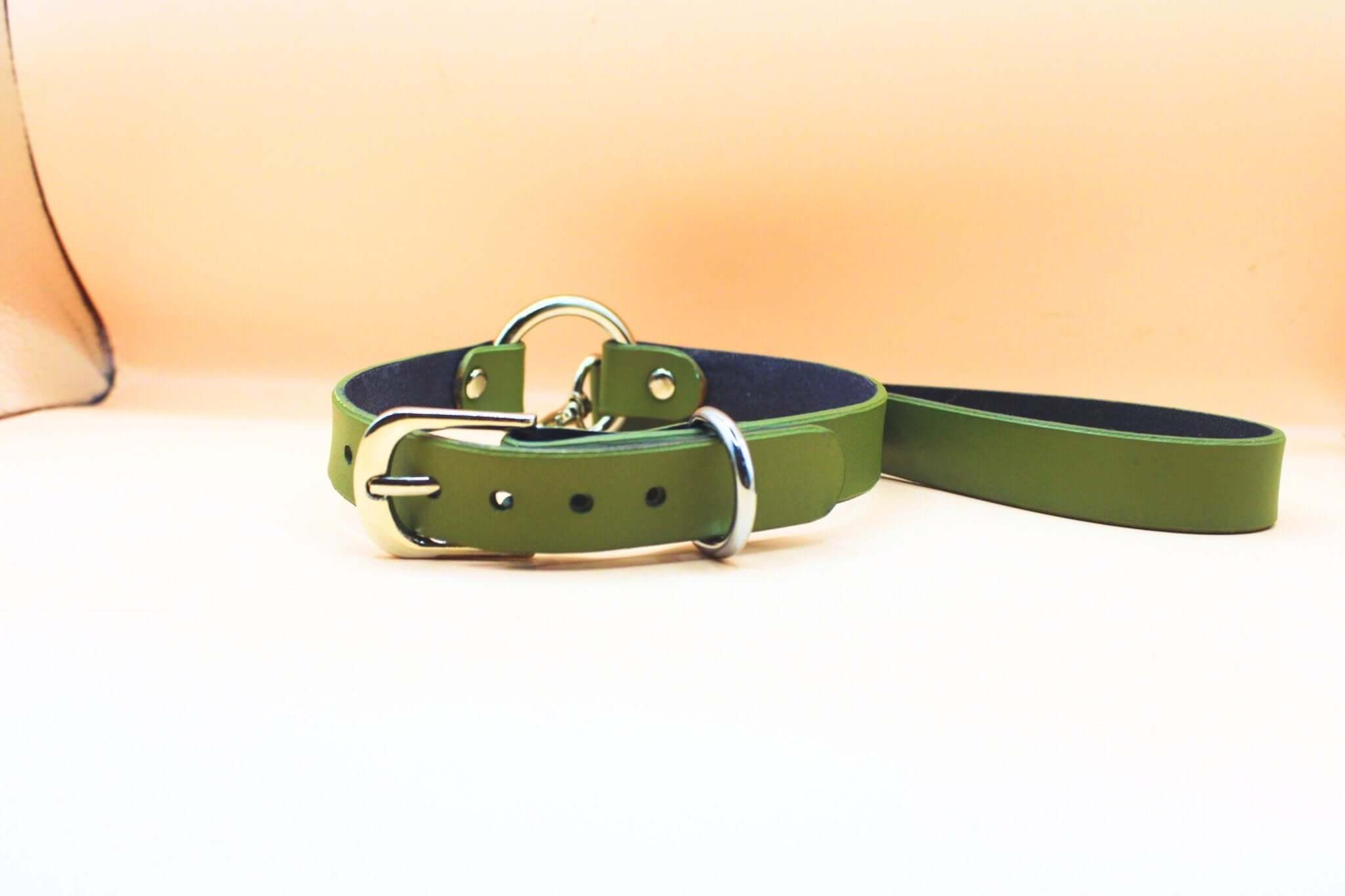 Olive green leather discreet collar and leash set, perfect for BDSM, submissive jewelry, and elegant day wear.