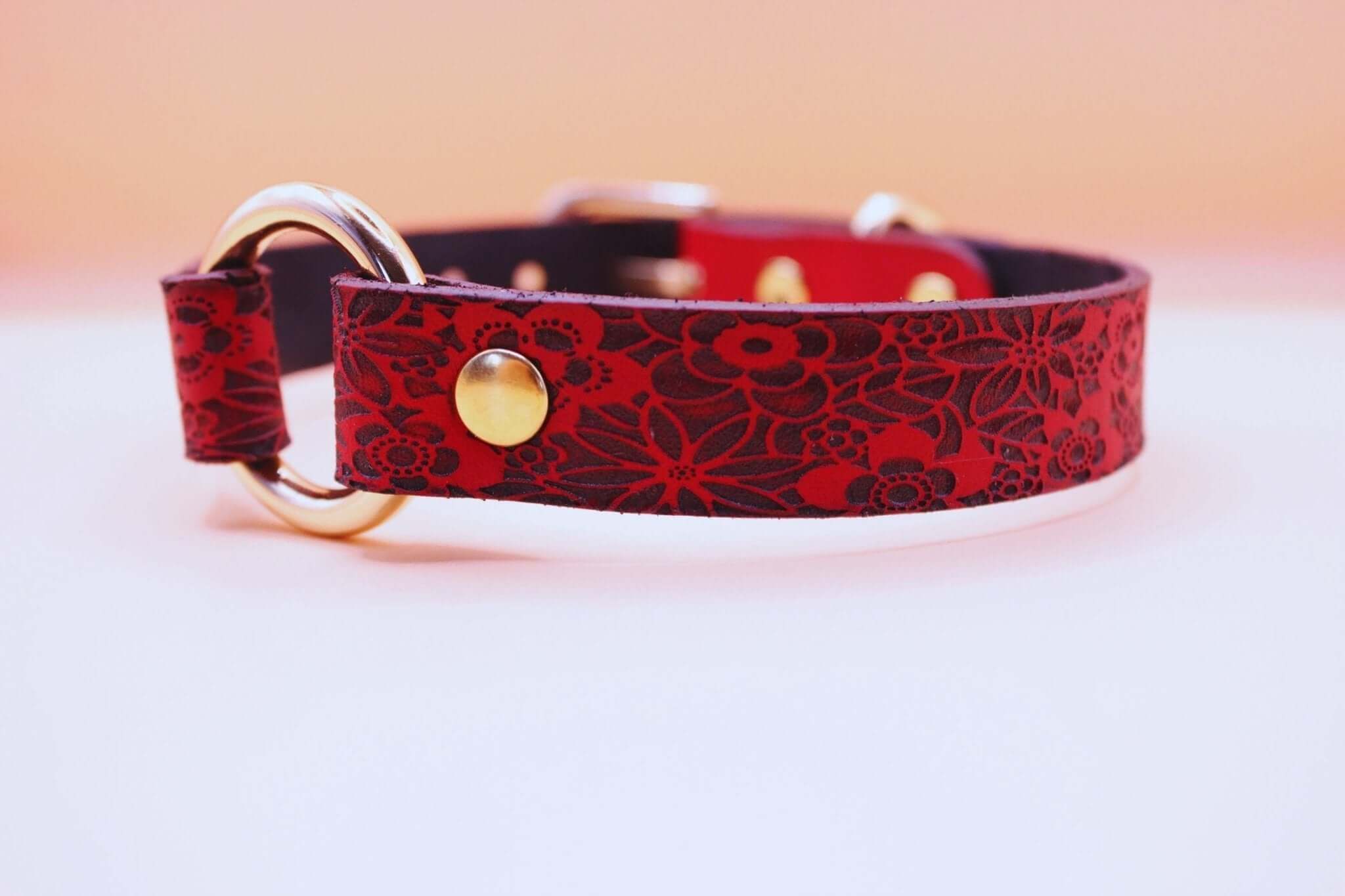 Handmade red floral leather collar with gold hardware, perfect for discreet day wear and BDSM sub jewelry.