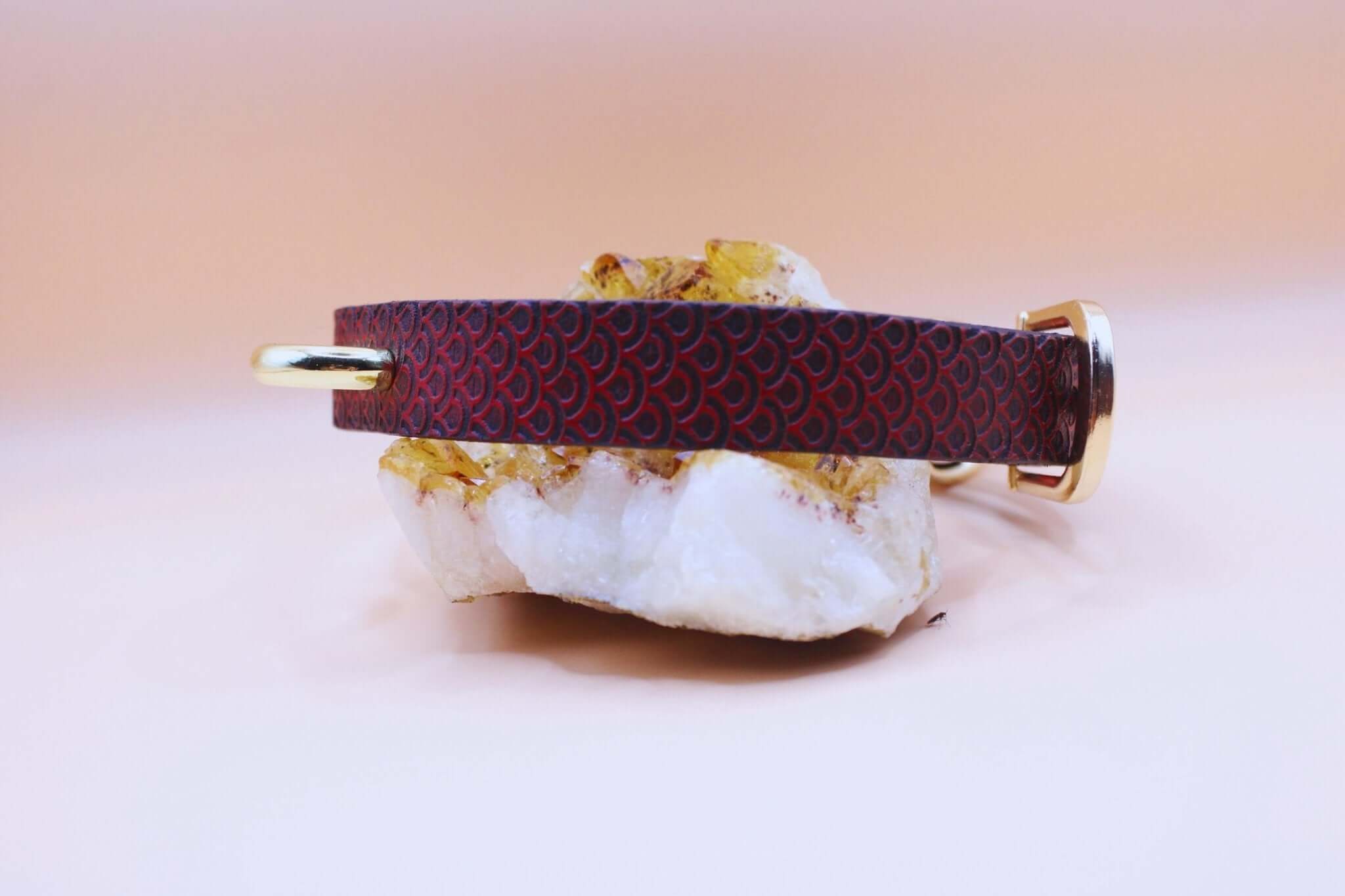 Red leather choker with scale texture, perfect for discreet BDSM style and everyday wear as a sub collar.
