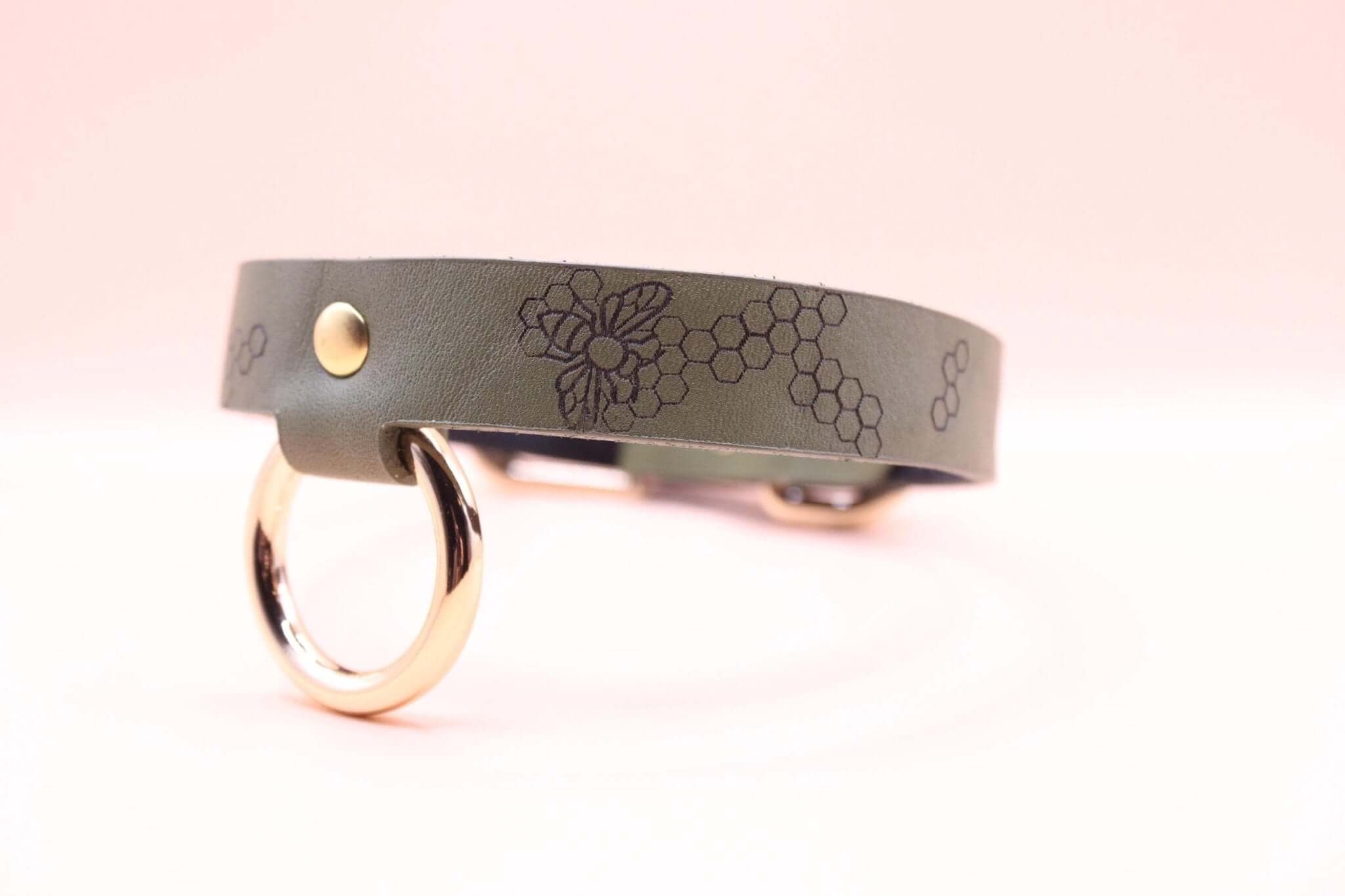 Discreet leather choker collar with gold ring, perfect for BDSM and submissive jewelry, blends elegance with everyday style.