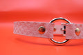 Discreet pink BDSM day collar leather choker, perfect for submissive jewelry and everyday wear.
