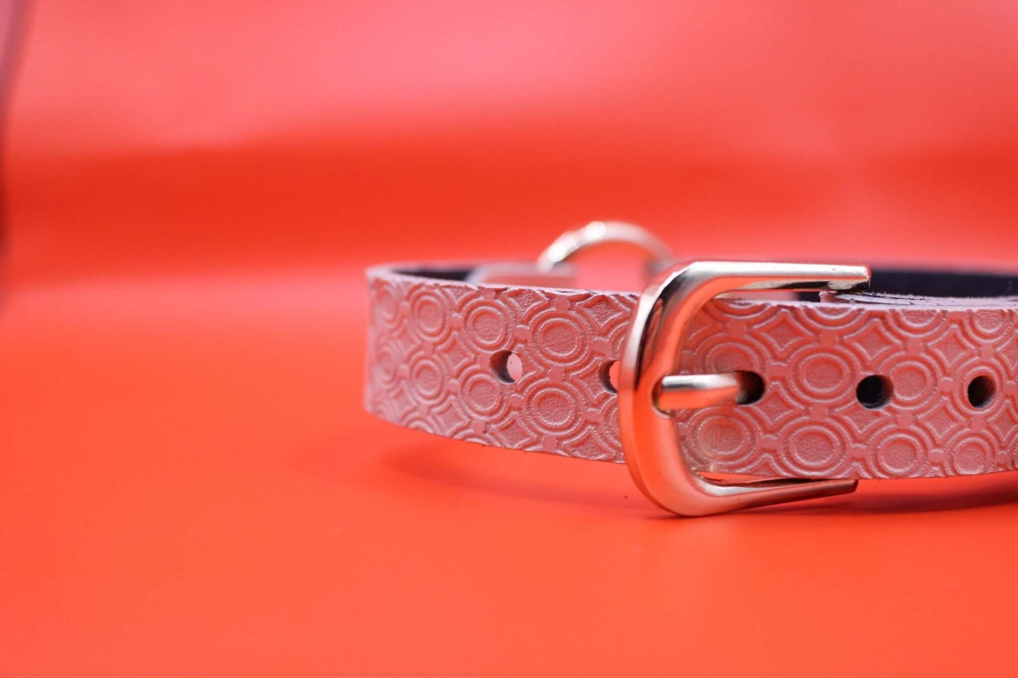 Discreet pink leather day collar with silver buckle, ideal submissive jewelry for BDSM and petplay.