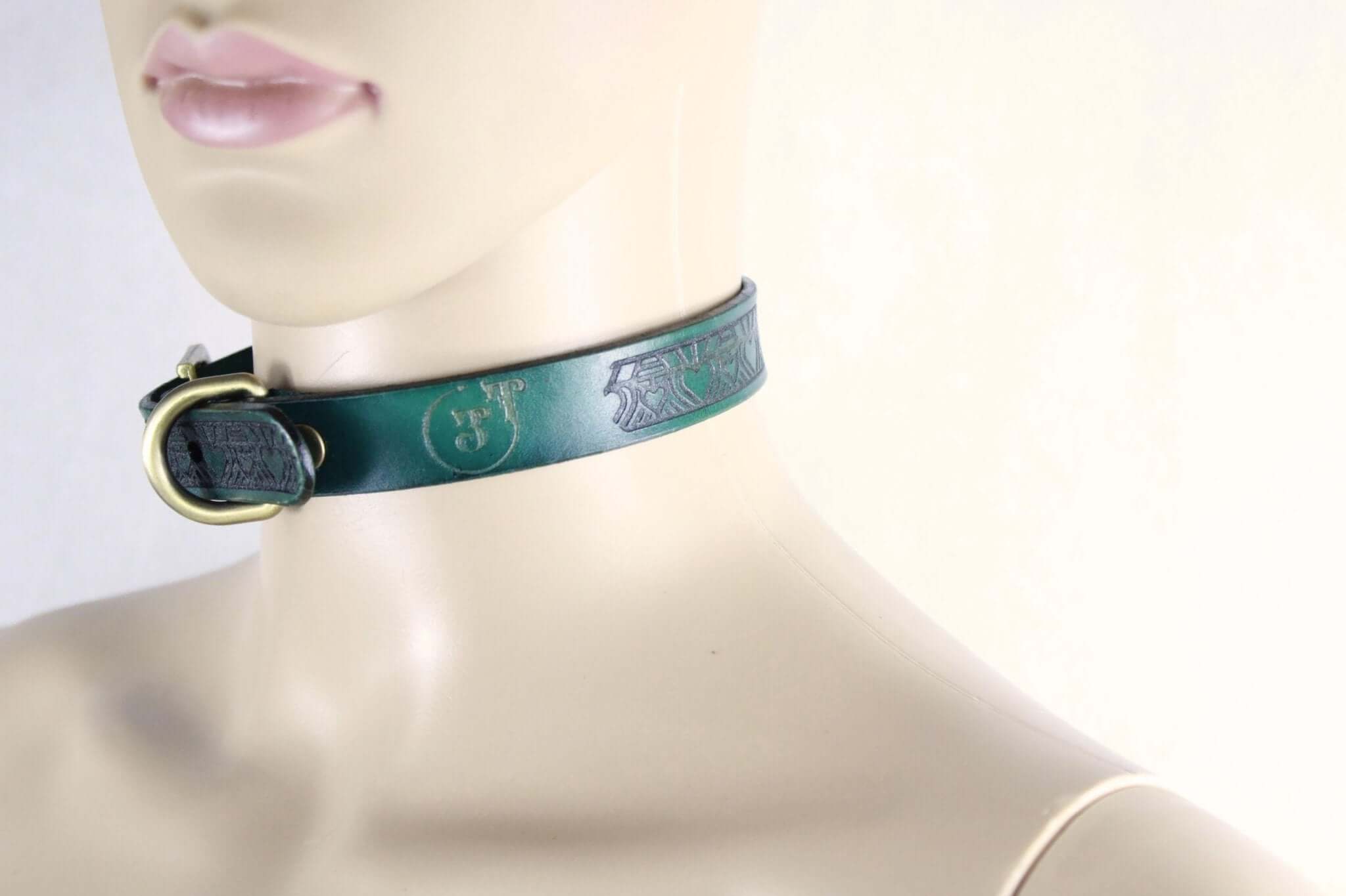 Elegant green leather discreet day collar, perfect for submissive jewelry and BDSM fashion.