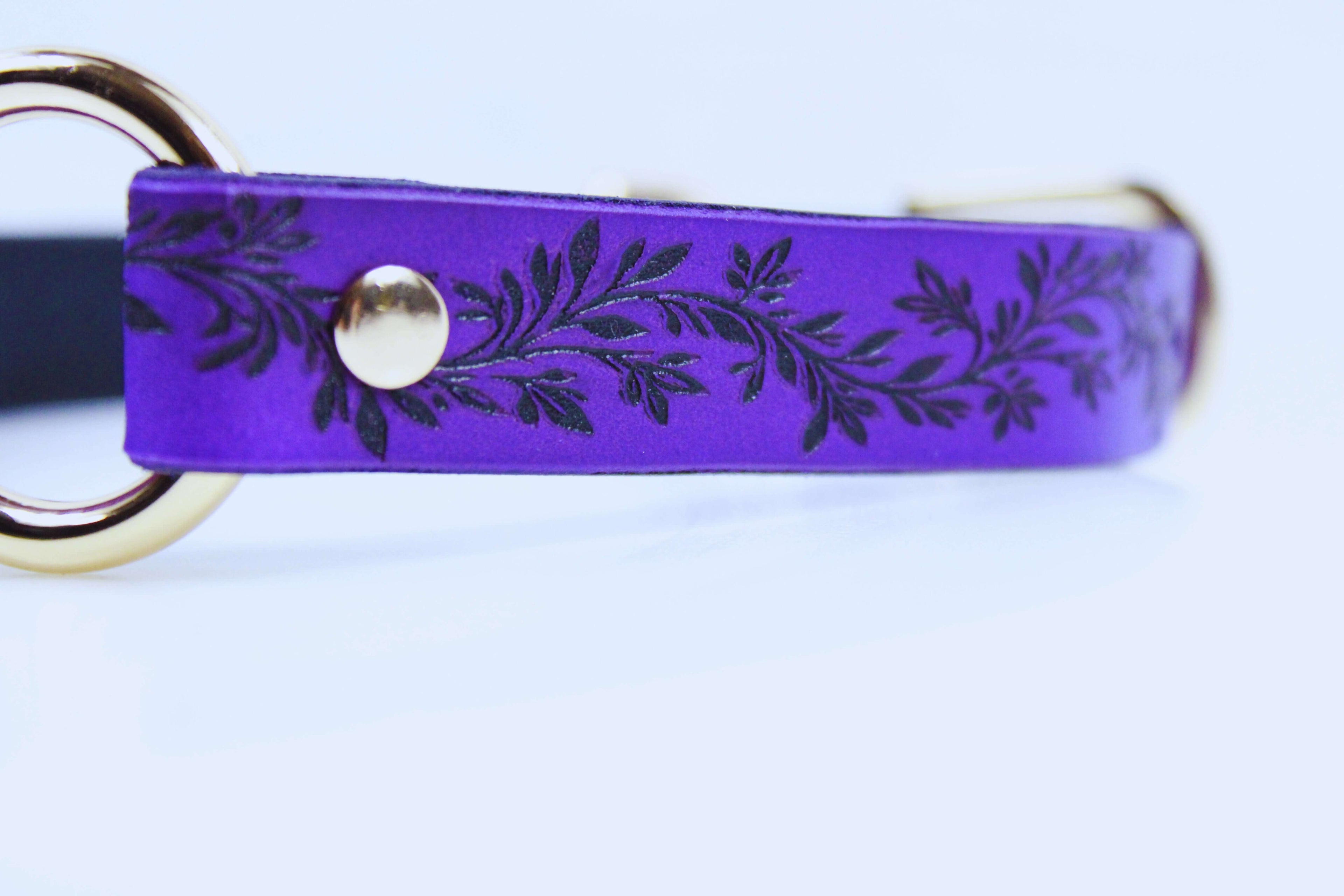 Leaf Pattern Submissive Day Collar in purple leather with elegant leaf design and gold accents.