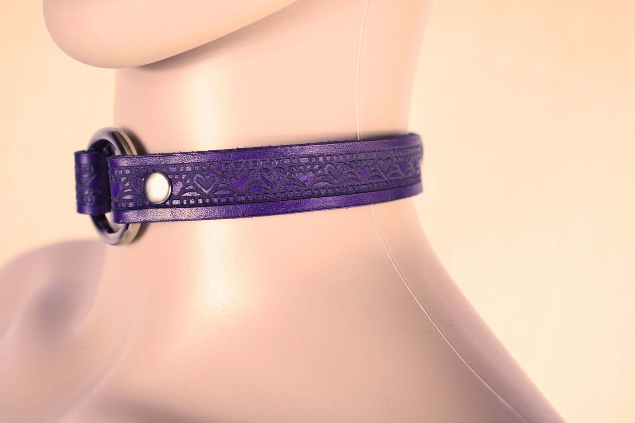 Elegant purple leather submissive collar design, perfect for discreet BDSM style and everyday wear.