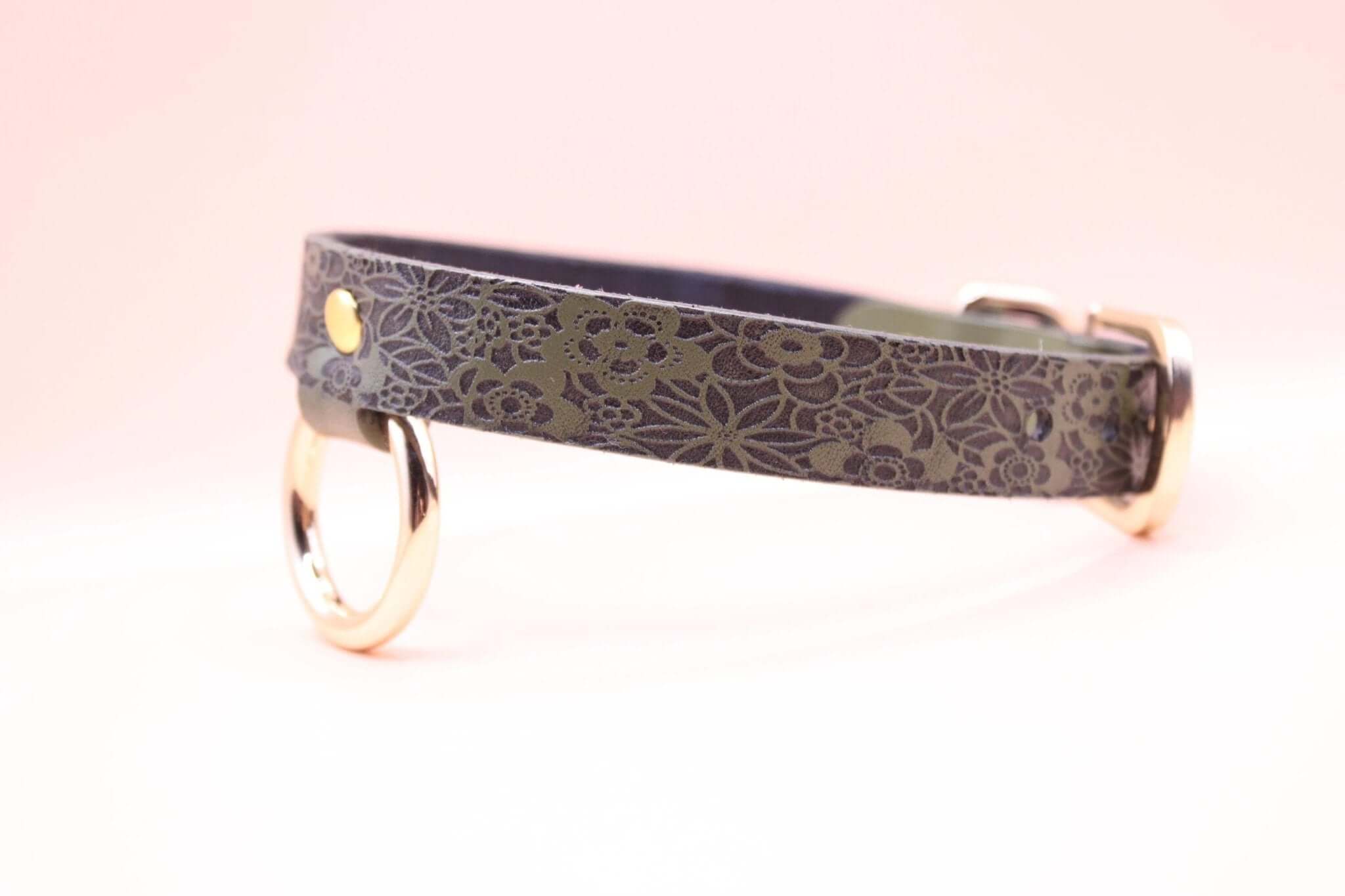 Elegant leather day collar with floral design, perfect submissive necklace for discreet everyday wear.