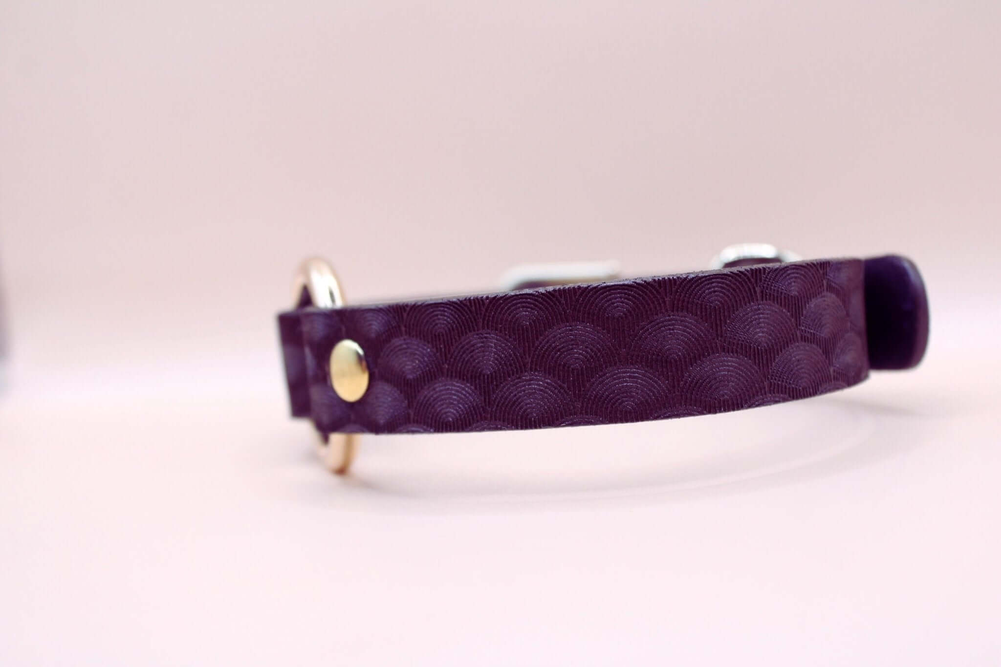 Elegant purple leather BDSM choker collar with scallop texture, perfect for submissive jewelry and discreet day wear.