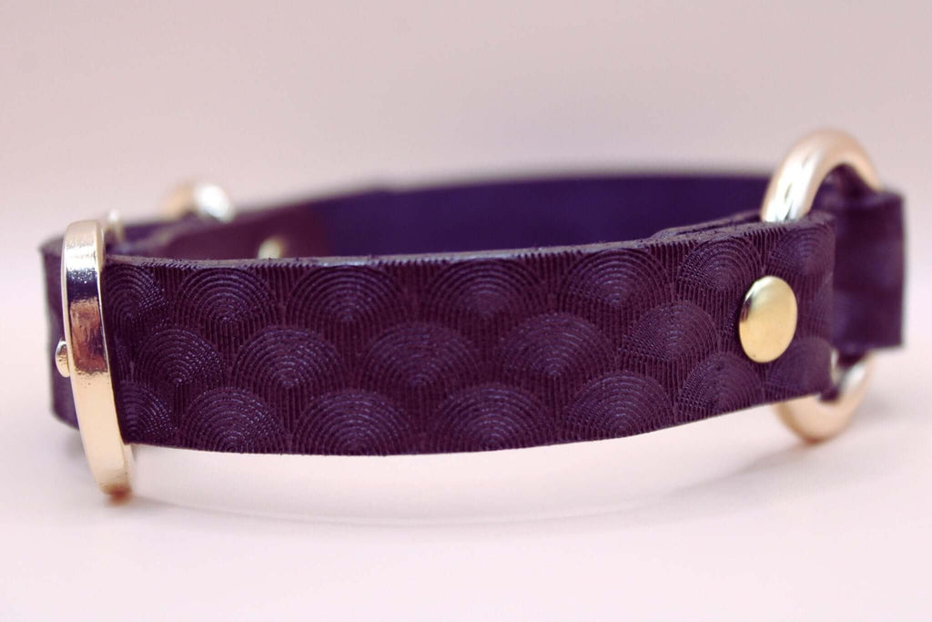 Elegant purple leather choker with scallop texture, BDSM discreet collar for submissive style and connection.