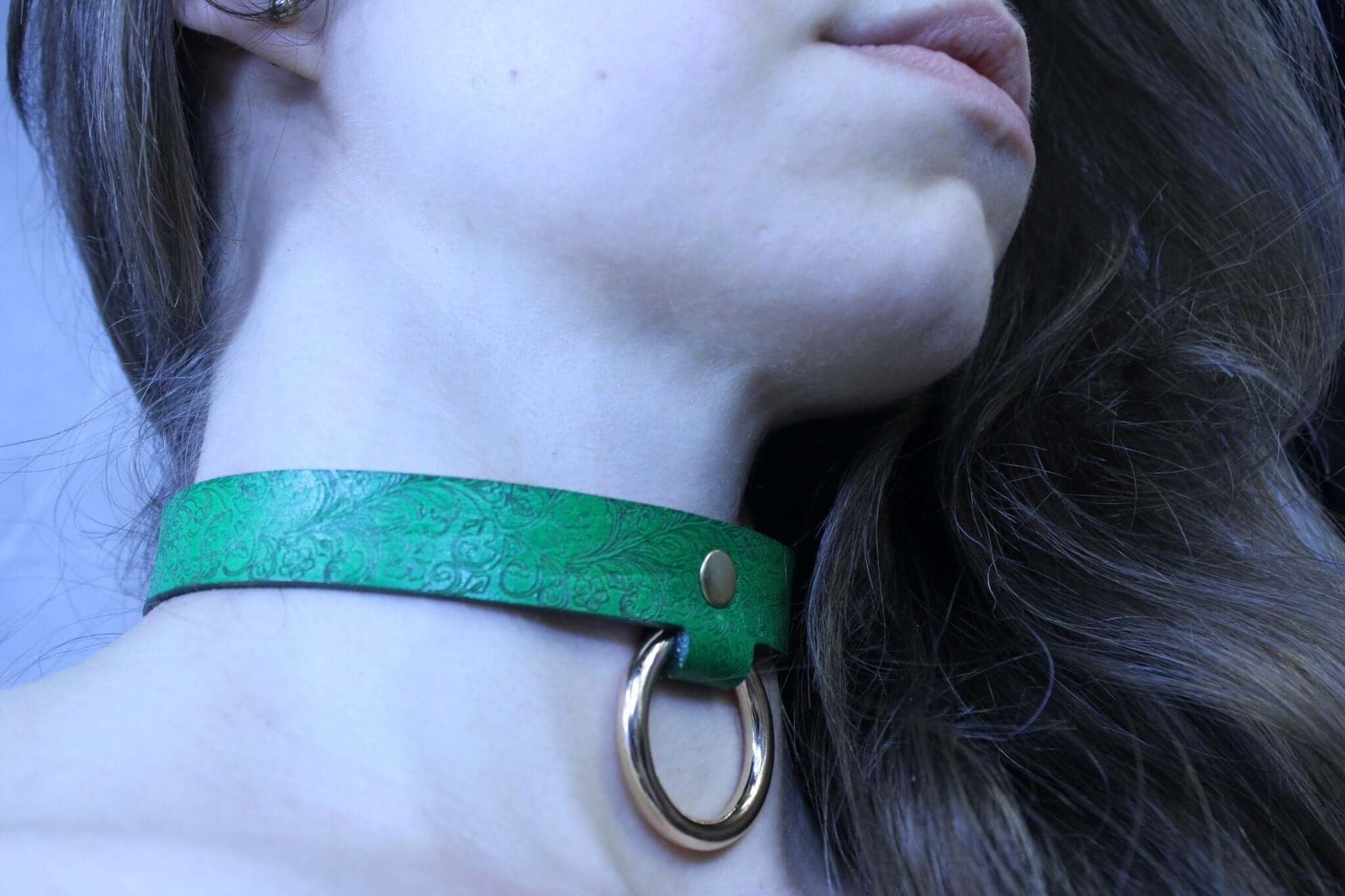 Emerald green submissive collar with gold ring for BDSM jewelry and discreet day wear, perfect for DDLG and bondage gear.