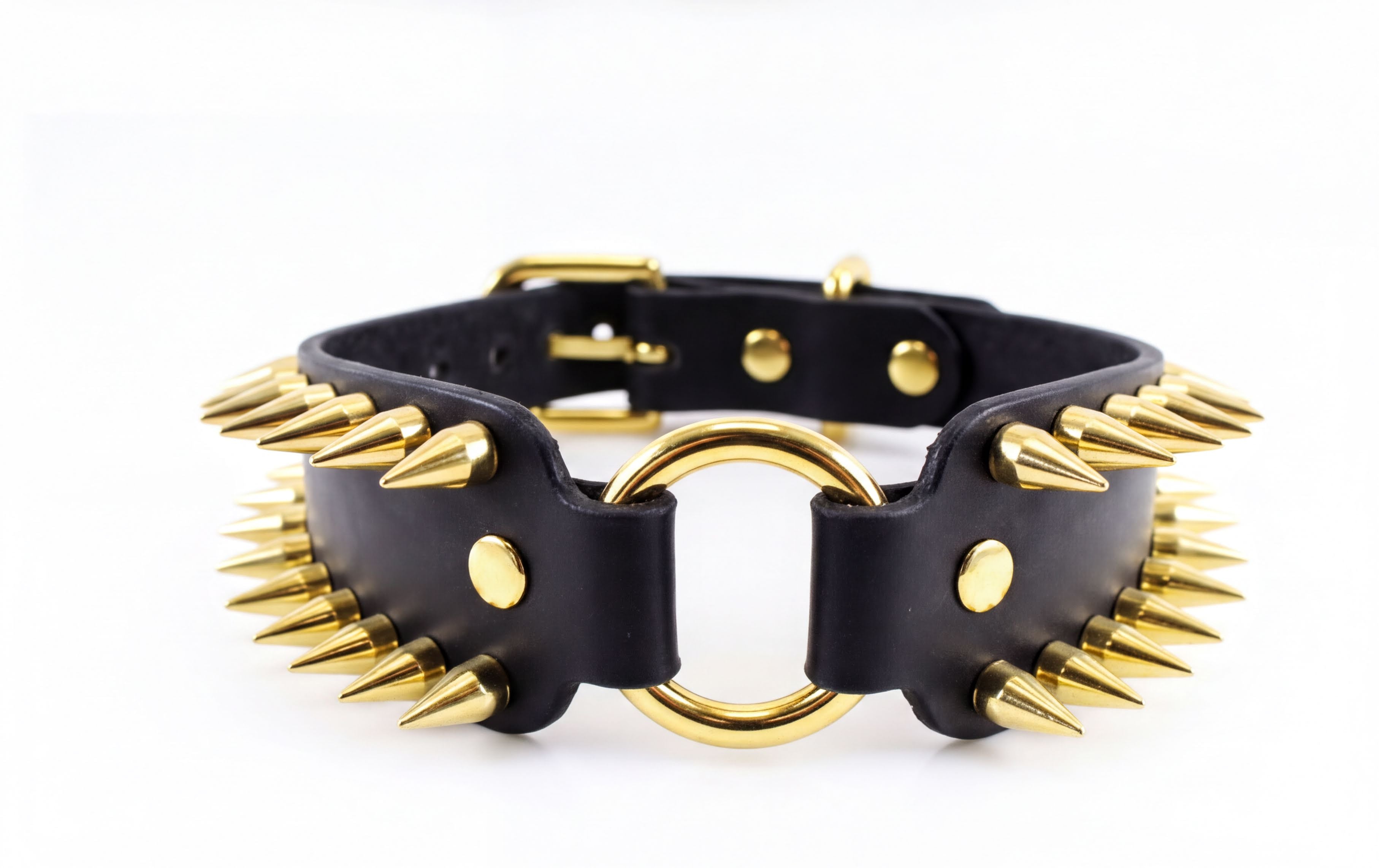 A black leather choker necklace with gold spikes protruding from it.