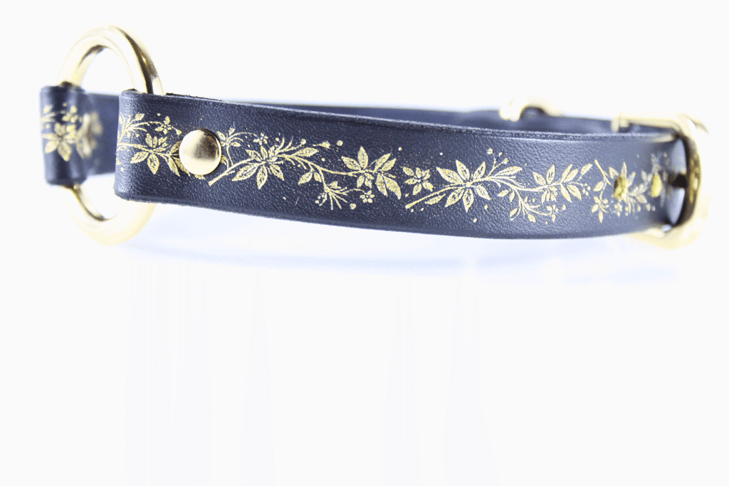 Black Leather Fetish Collar with golden floral pattern and polished O-ring, elegant and subtle design.
