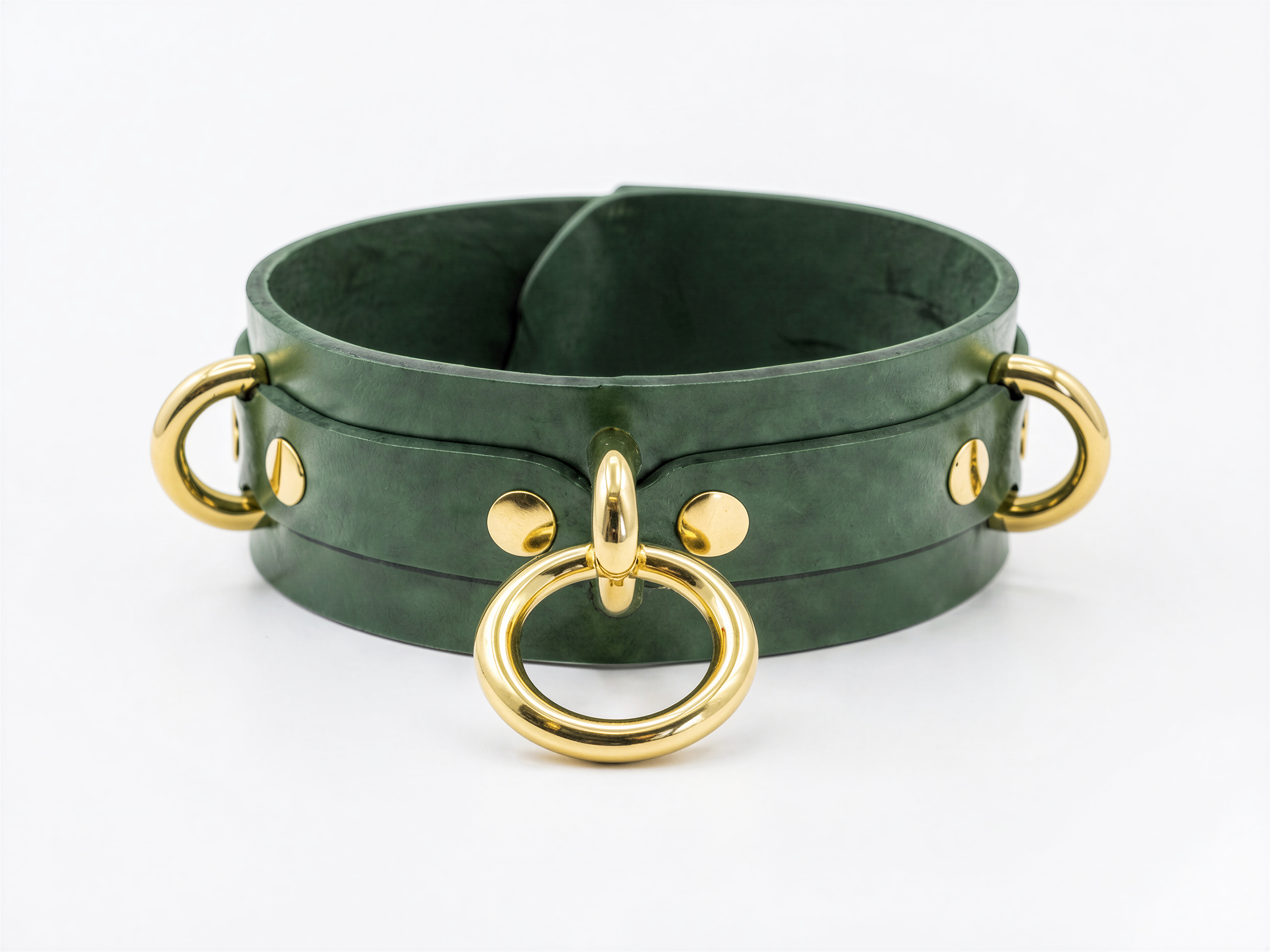 A green leather choker necklace with gold-colored metal rings and handles.