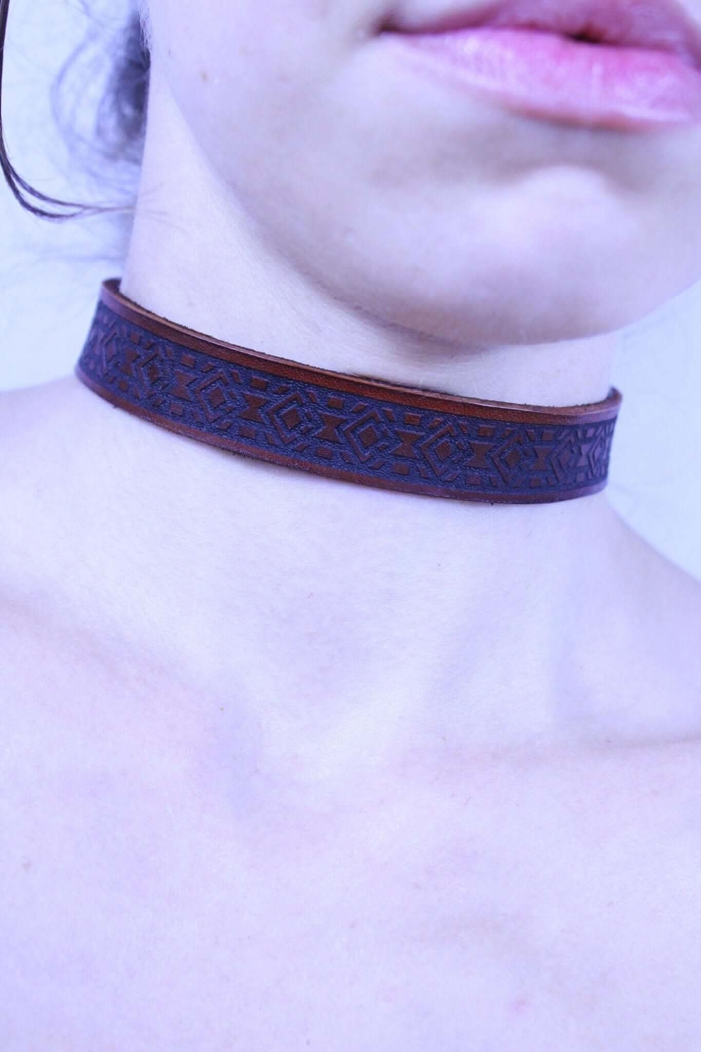 Geometric leather sub collar showcasing intricate design, perfect for submissive jewelry and discreet BDSM day collar.