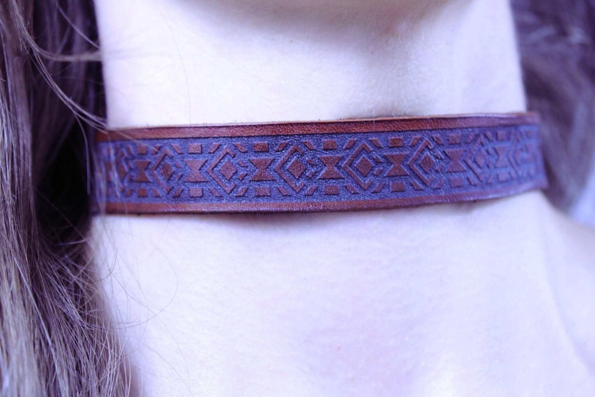 Geometric leather sub collar close-up, ideal for BDSM jewelry, discreet day collar, and submissive fashion accessories.