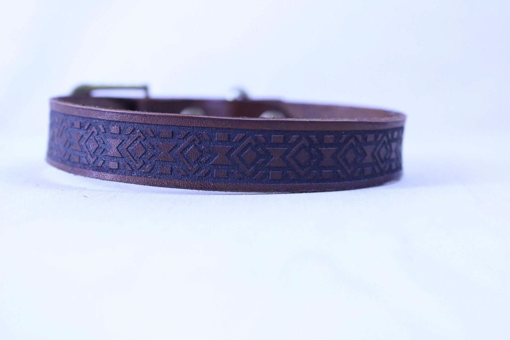 Geometric leather BDSM day collar, a stylish and symbolic expression of submissive jewelry and identity.