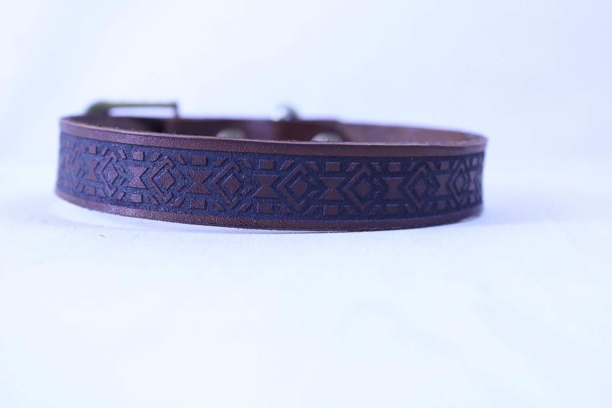 Geometric leather BDSM day collar, a stylish and symbolic expression of submissive jewelry and identity.