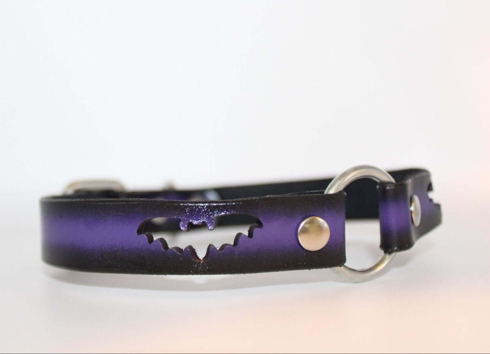 Gothic bat collar with cutout design and O-ring, perfect for BDSM, fashion, and alternative style.