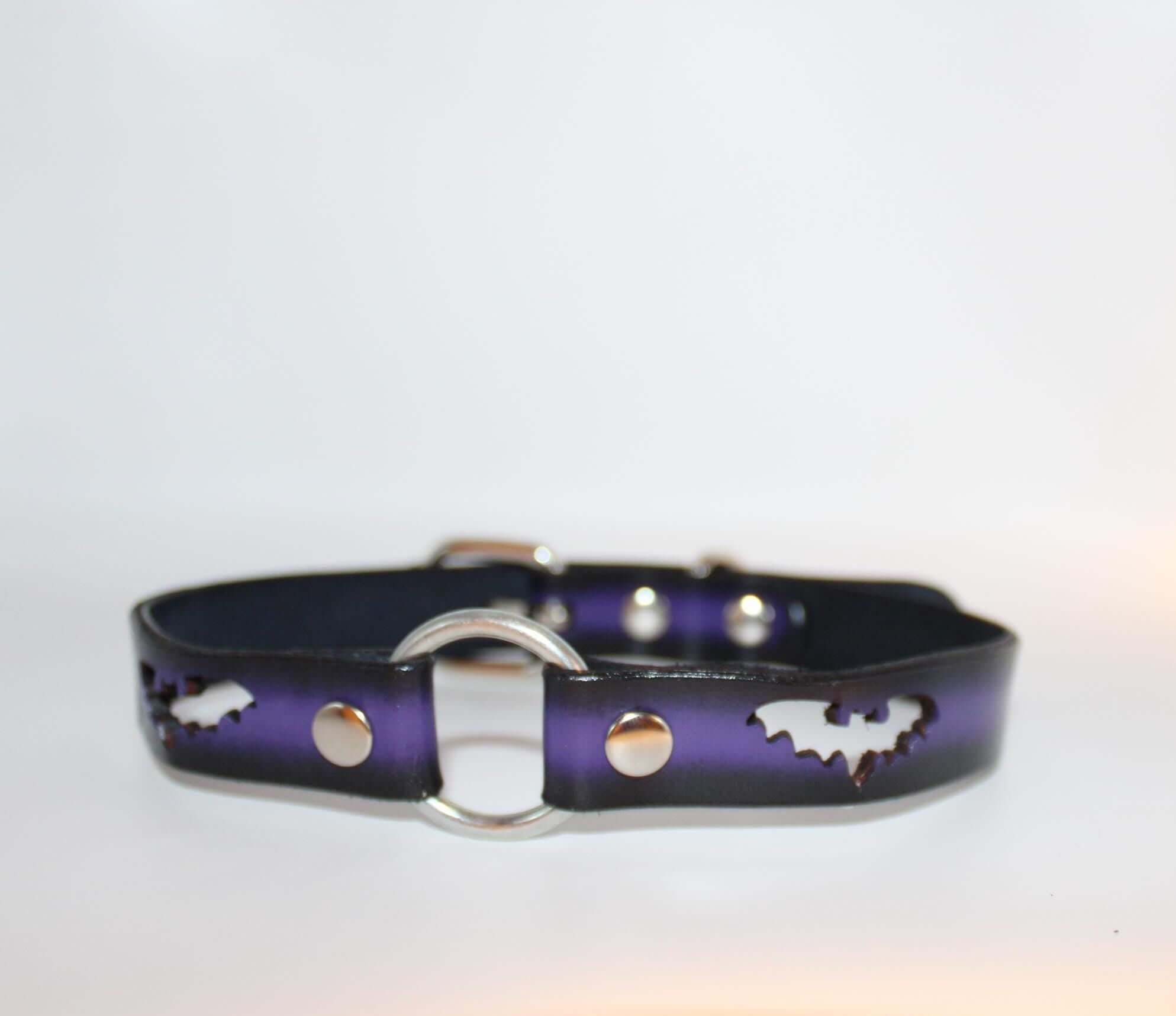 Gothic bat collar with cutout design, O-ring, and leather finish for BDSM and alternative fashion.