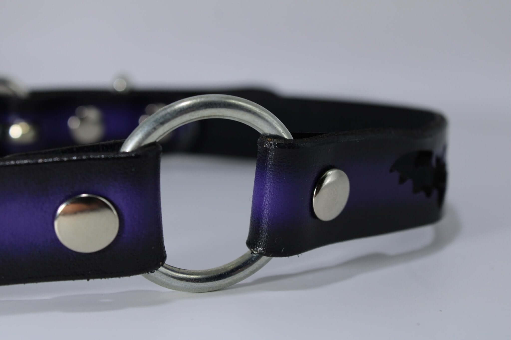 Gothic bat collar with O-ring, perfect for BDSM fashion and alternative style. Ideal submissive jewelry or discreet day collar.