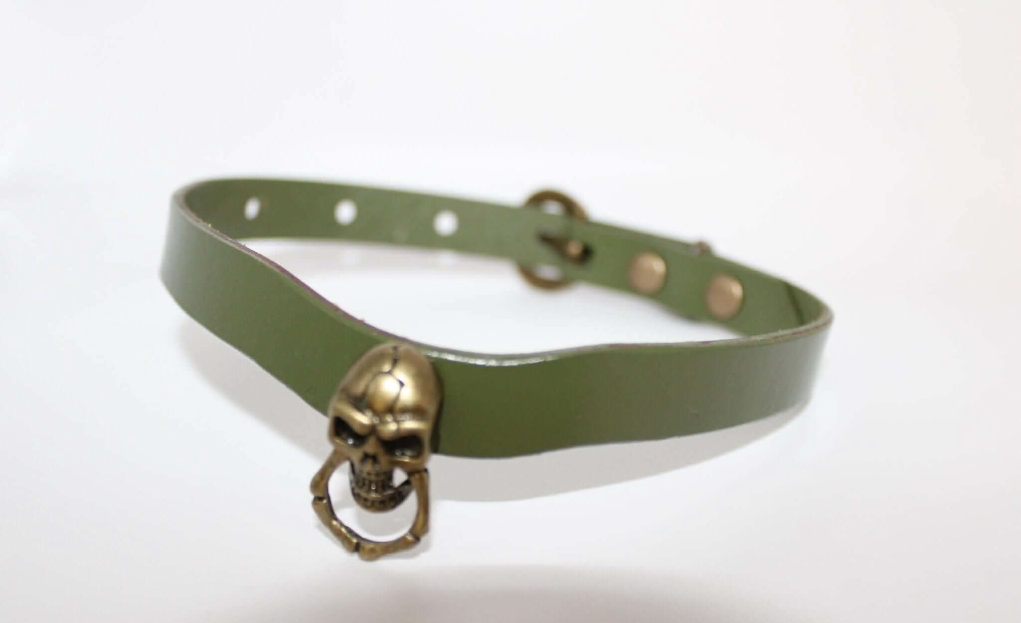 Gothic skull collar choker with O-ring, punk alternative jewelry, BDSM bondage accessory.