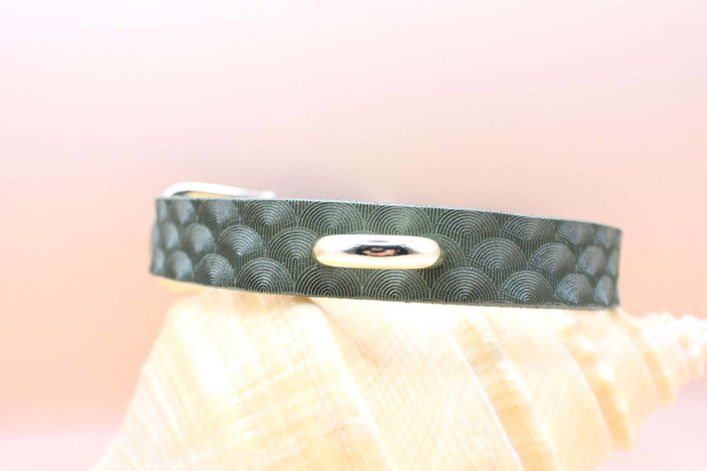 Green leather choker collar for discreet day wear, perfect for submissive jewelry and BDSM style.
