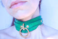 Green leather posture collar with floral embossing, perfect for BDSM, submissive jewelry, and discreet day collar wear.