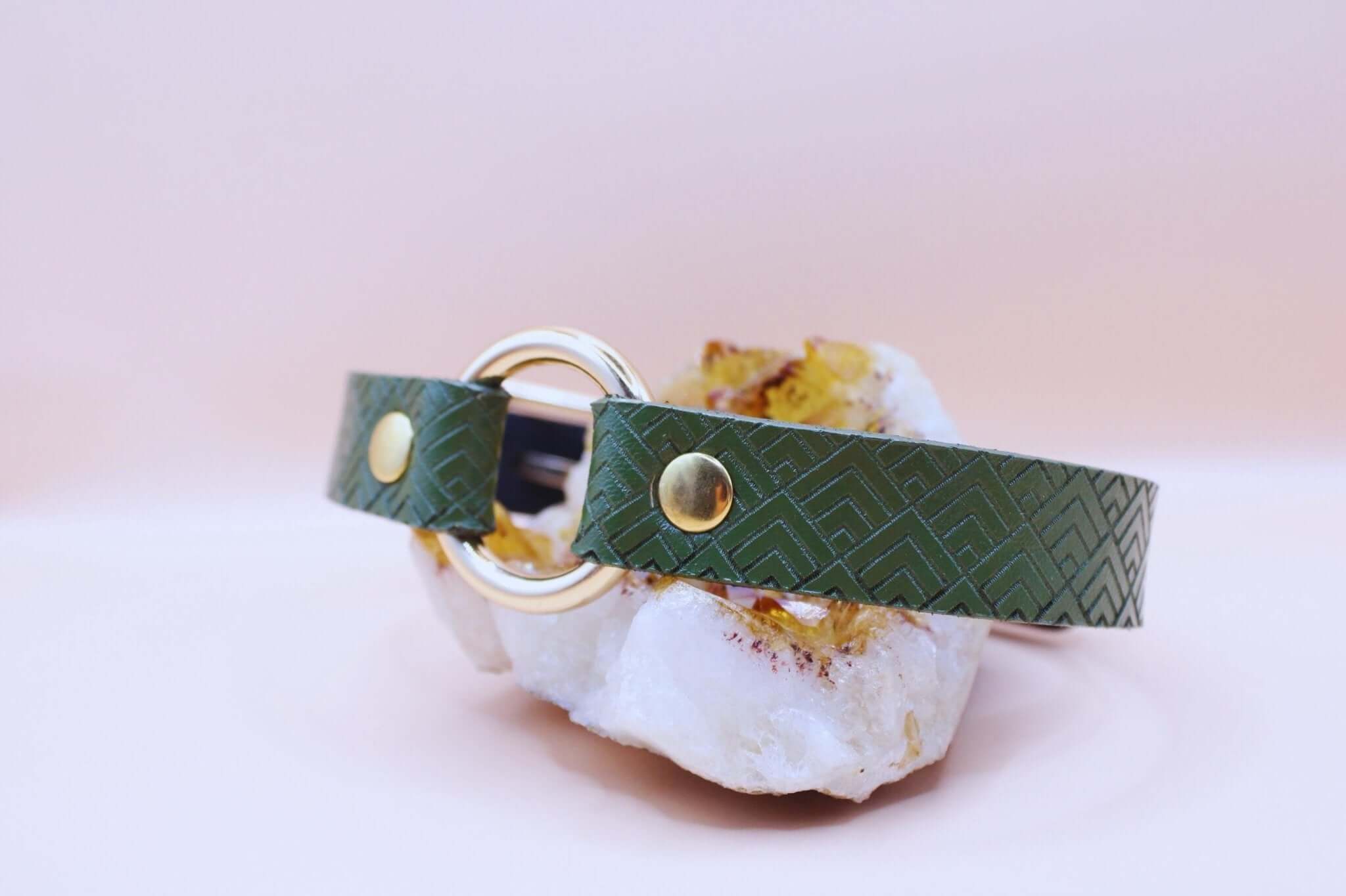 Green geometric O-ring slave collar made of leather, perfect for BDSM, submissive jewelry, and discreet day wear.